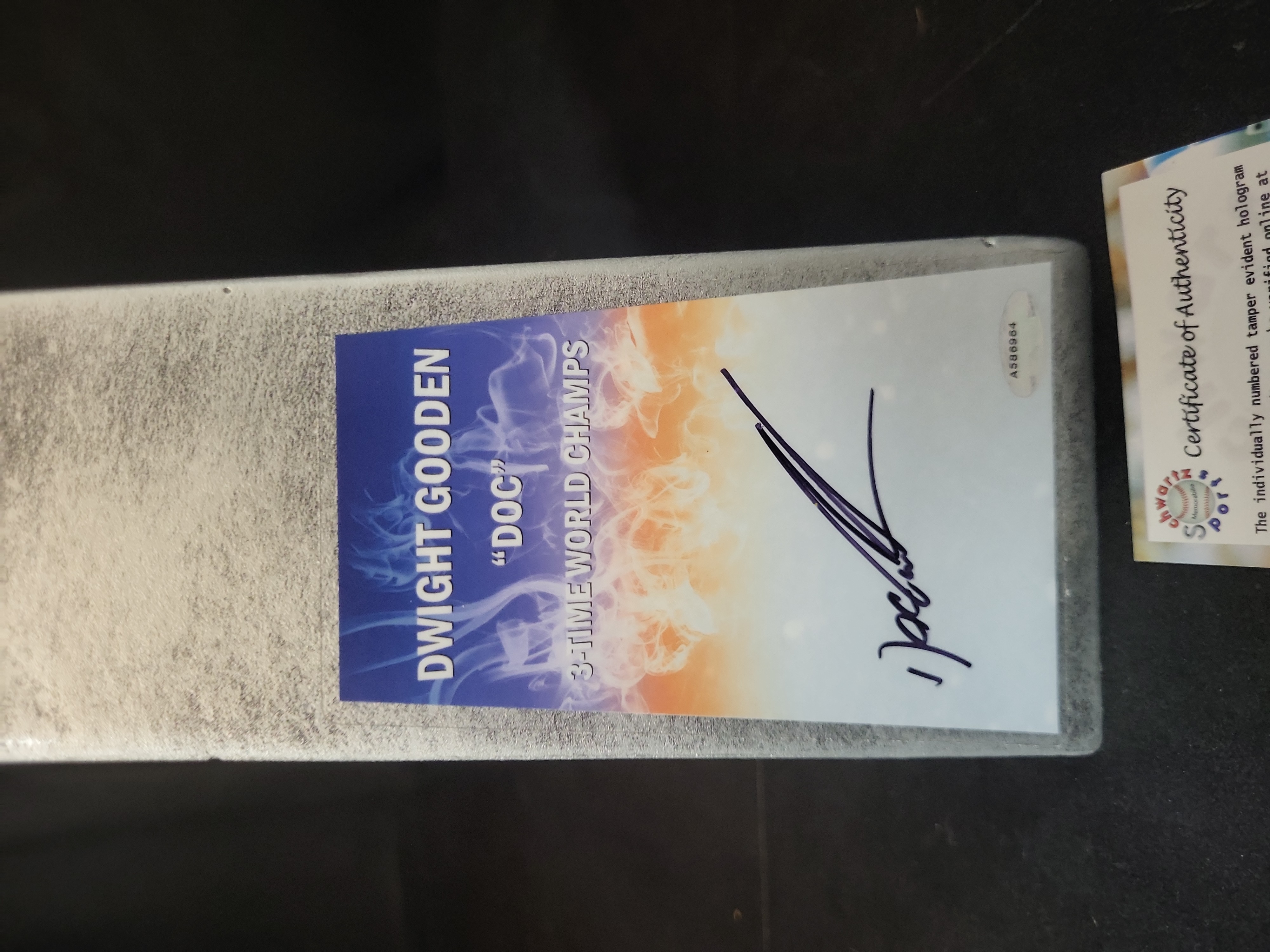I03119 | Dwight Doc Gooden Signed 14-Inch Replica Silver World Champion Baseball Trophy