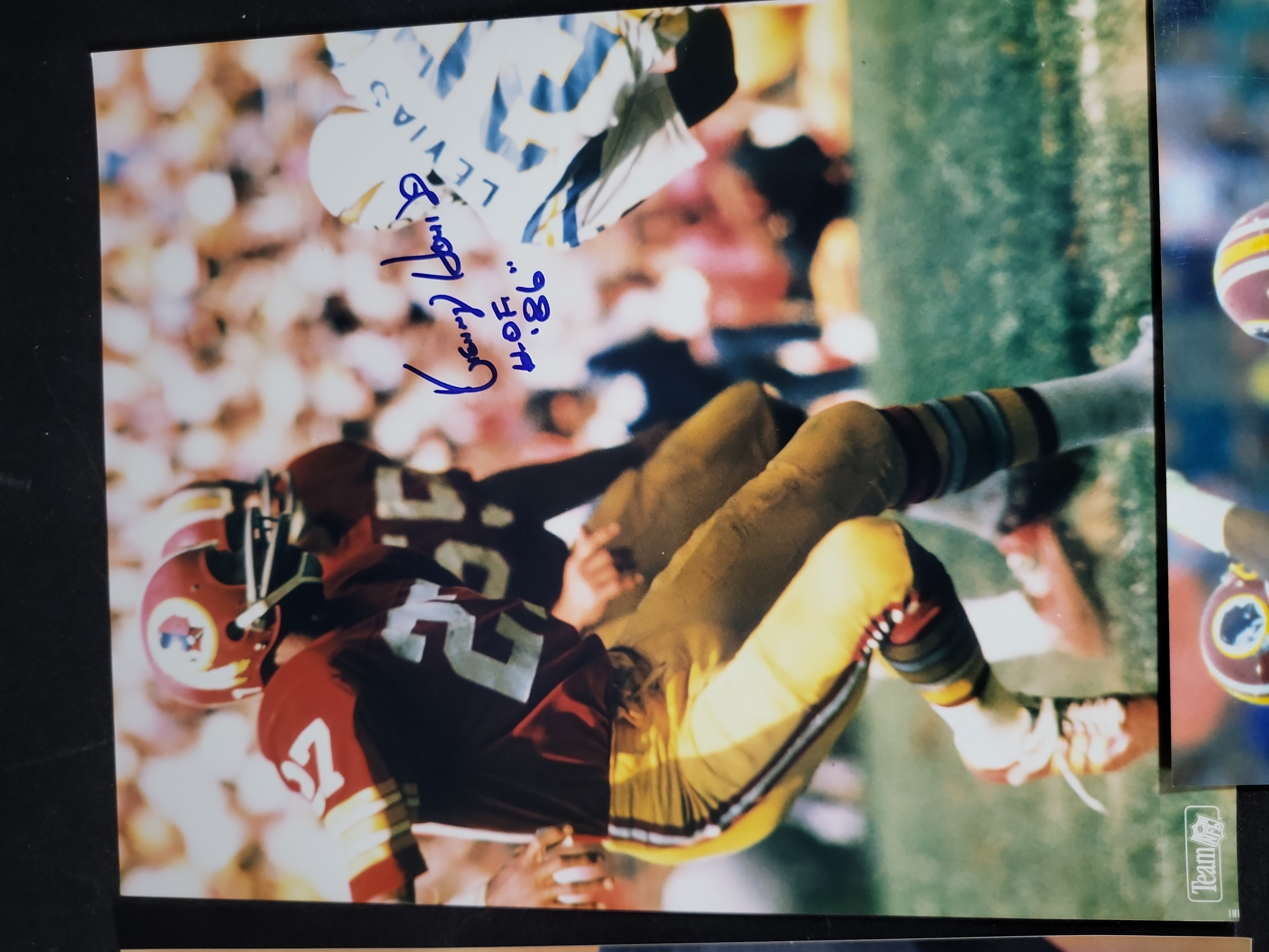 I03410 | A Lot of Four Autographed NFL Football Photographs Featuring Gale Sayers, Charley Taylor, Ken Houston, and Joe Jacoby