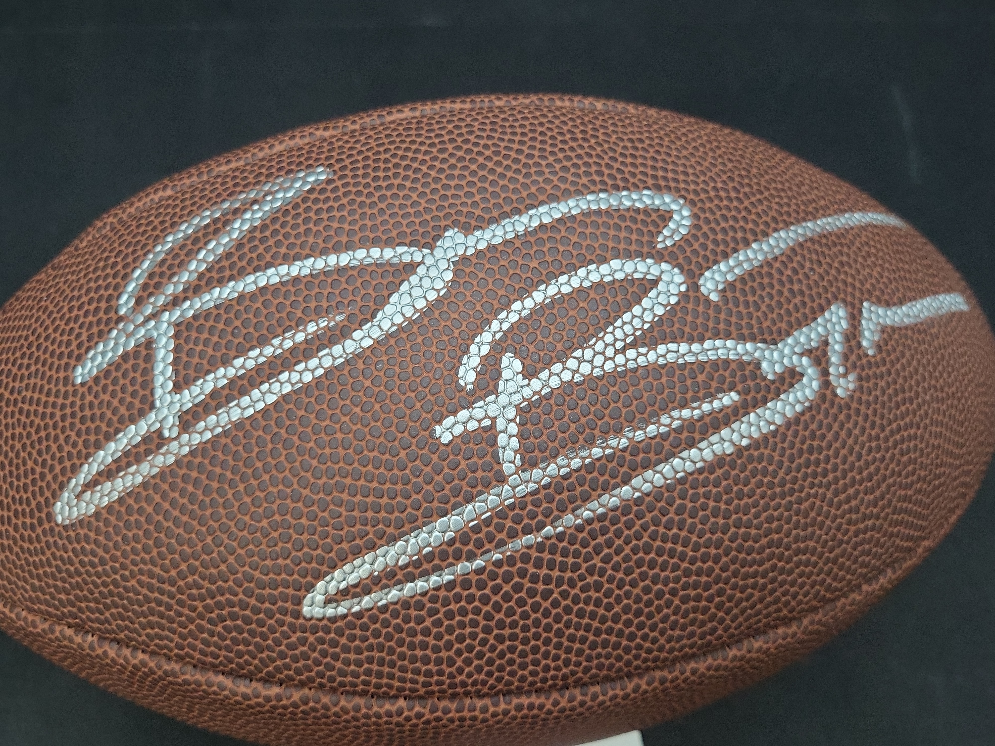 I03571 | Brian Bosworth Signed Wilson Super Grip Official Size NFL Football Beckett Witnessed Authentication