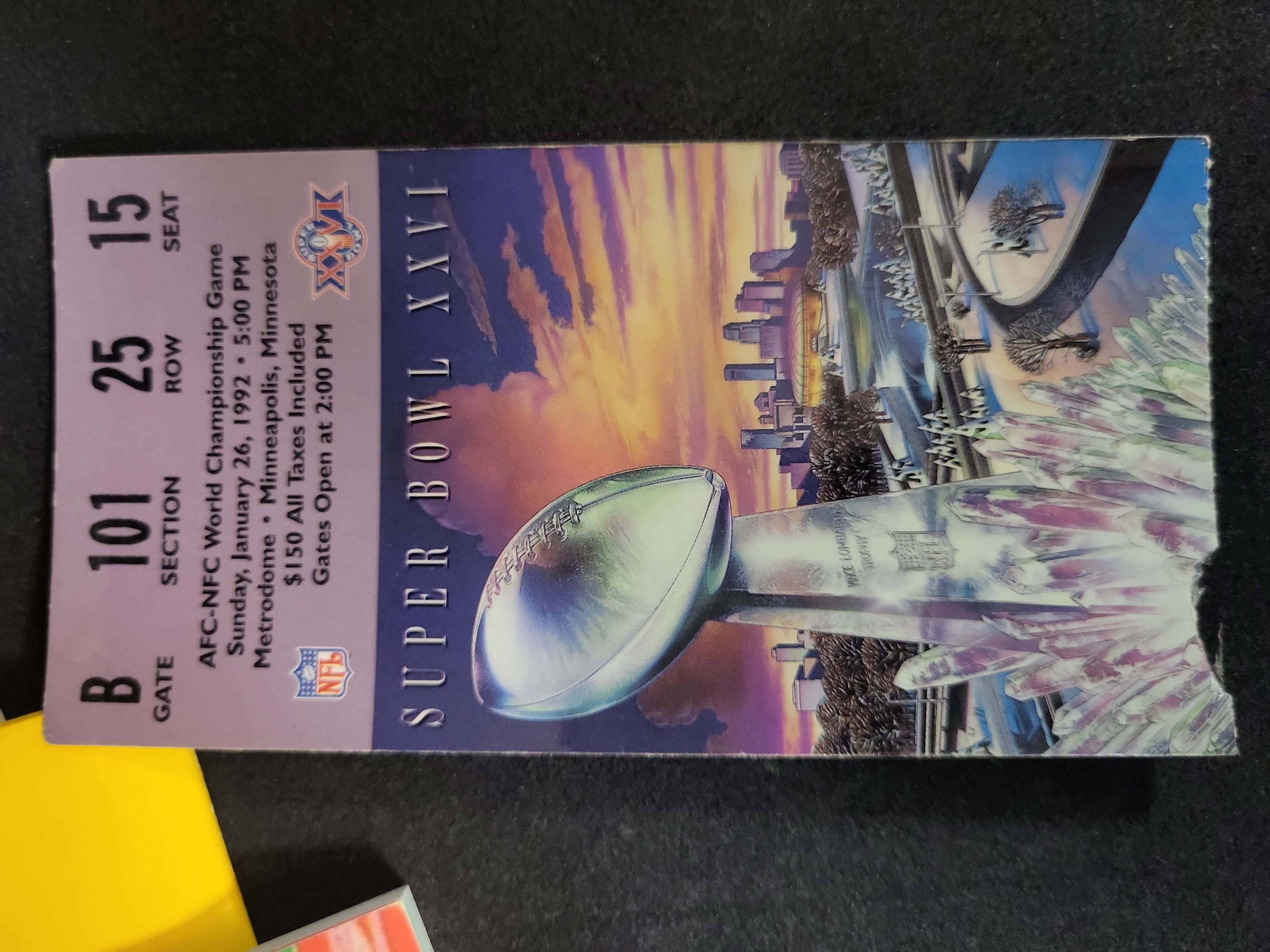 I03210 | A Collection of Super Bowl XXVI Memorabilia including Game Ticket, Seat Cushion, and Pro Set Card Binder