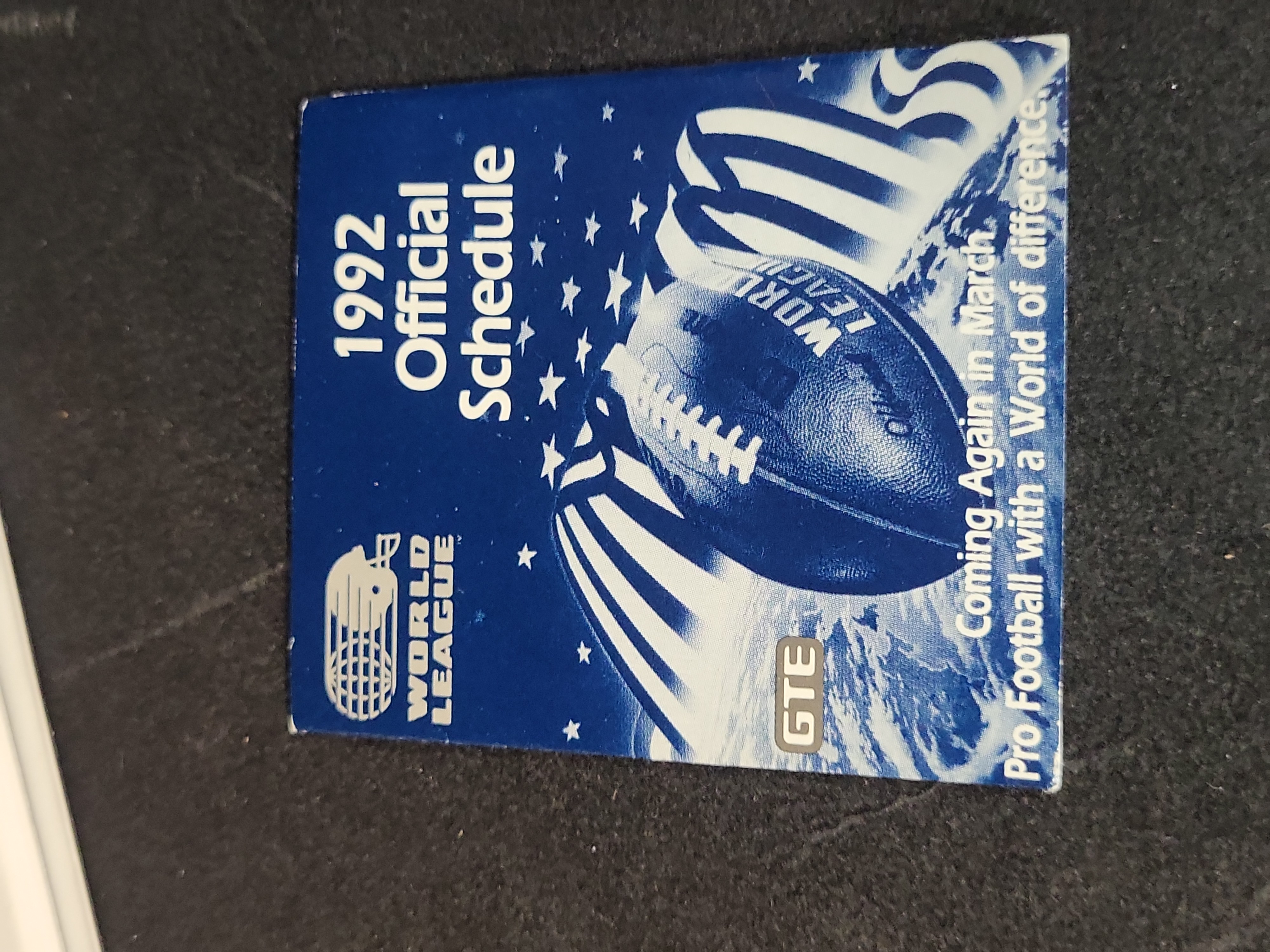 I03210 | A Collection of Super Bowl XXVI Memorabilia including Game Ticket, Seat Cushion, and Pro Set Card Binder