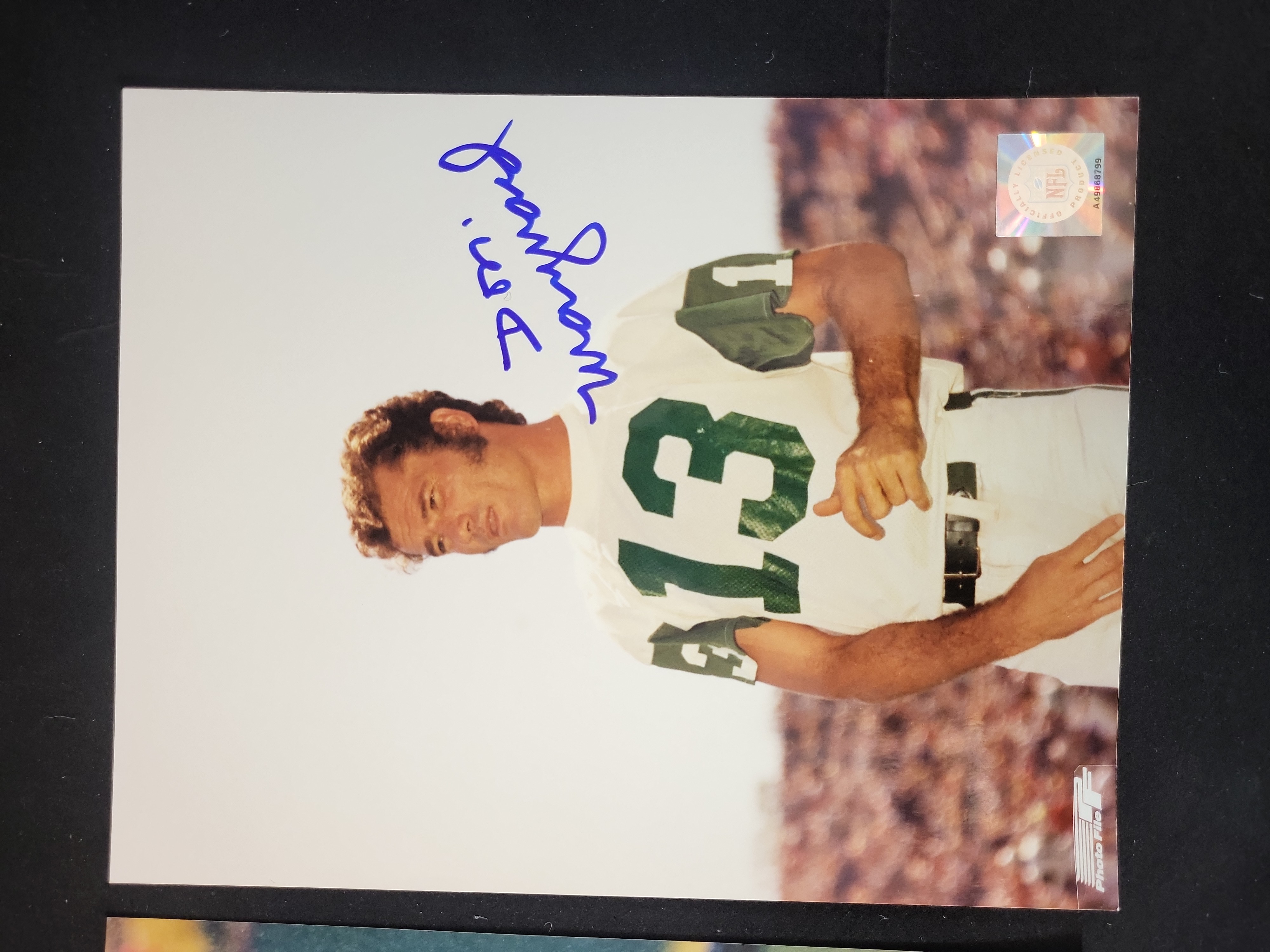 I01483 | Two New York Jets Autographed Photographs featuring Vinny Testaverde and Don Maynard