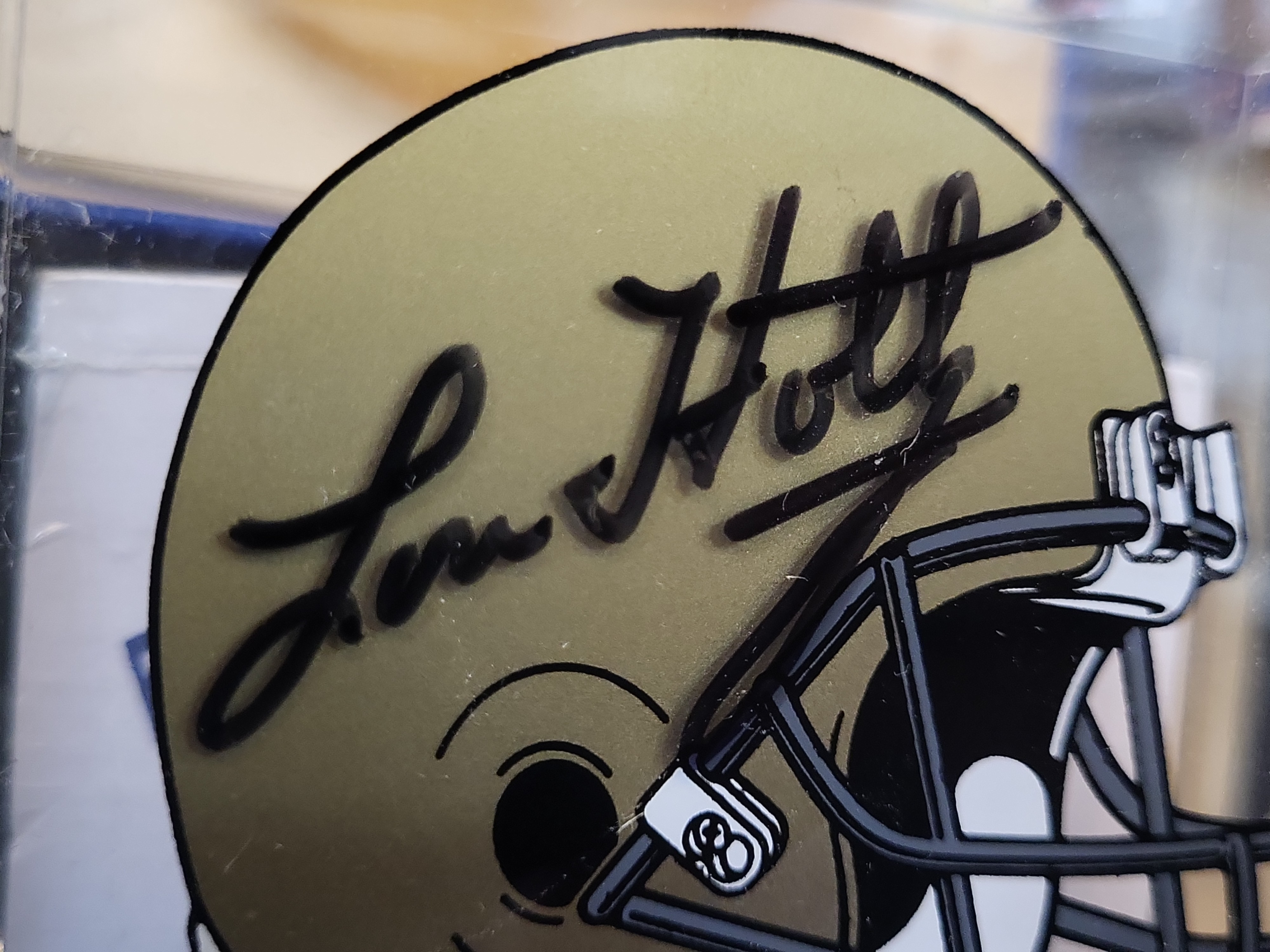 I03056 | A Collection of Four University of Notre Dame Fighting Irish Collectibles Including a Lou Holtz Signed Desk Accessory