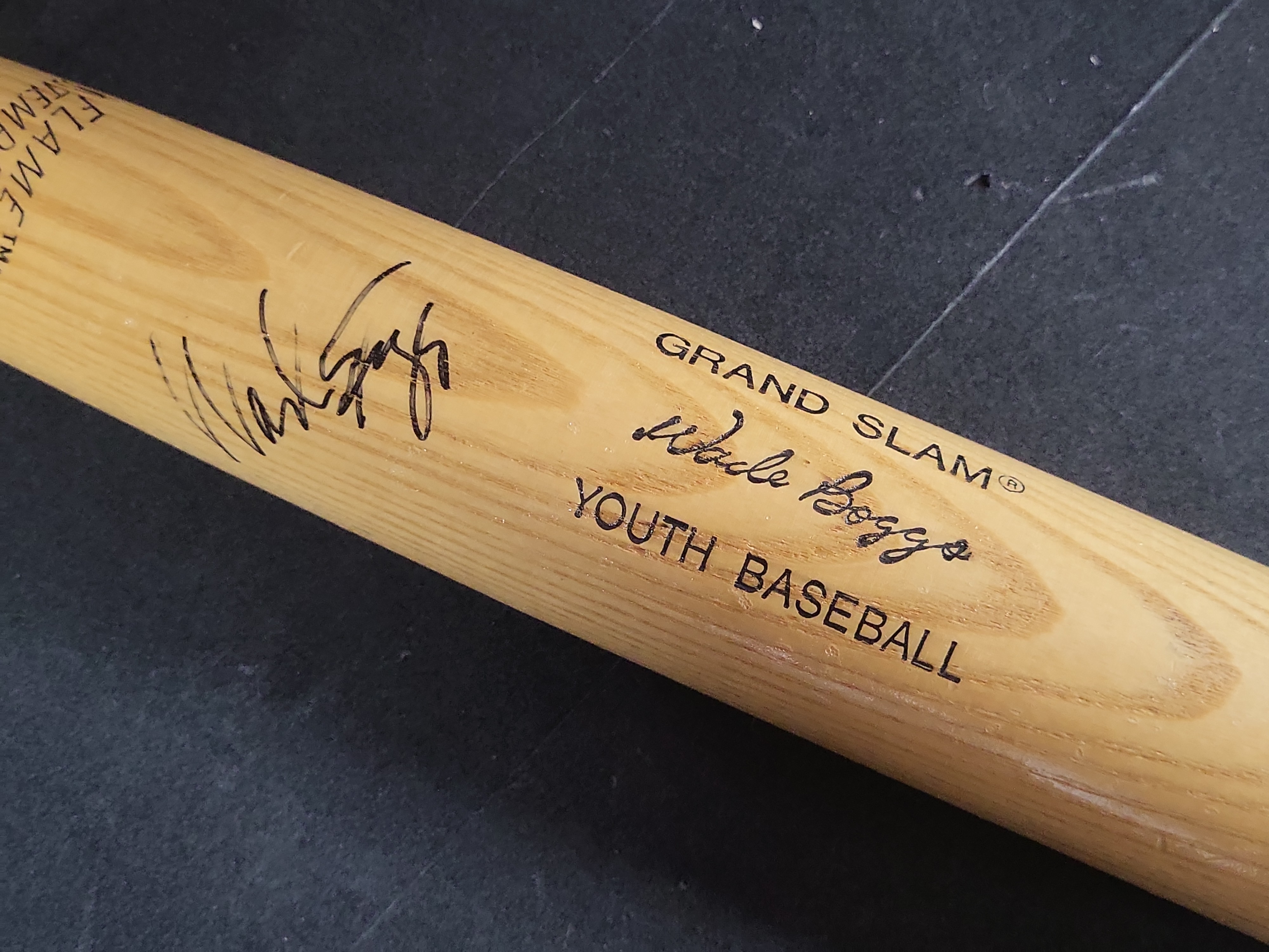 I03112 | Wade Boggs Autographed Louisville Slugger Grand Slam Youth Baseball Bat with JSA Authentication