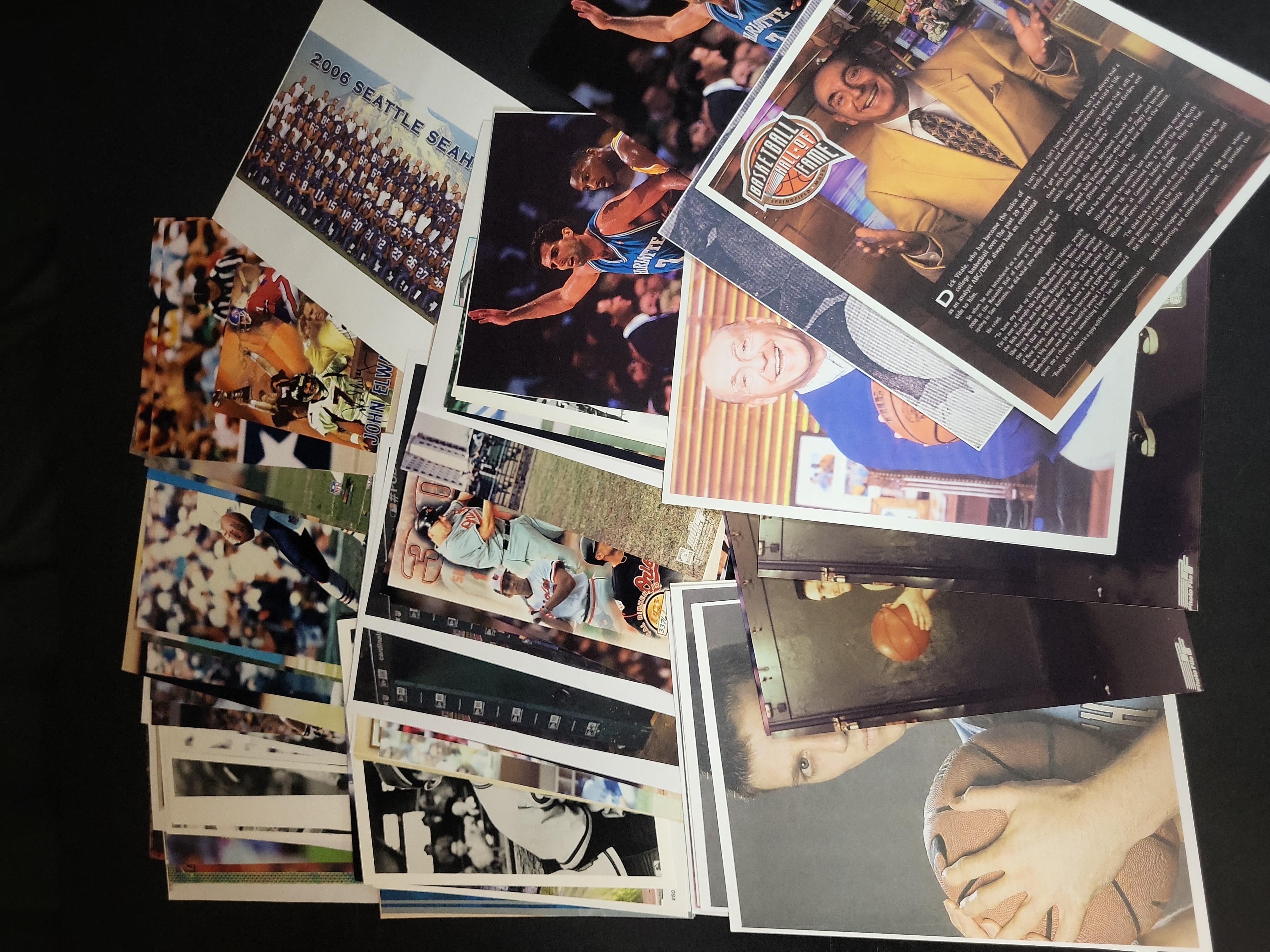 I03040 | A Collection of Professional Sports Photographs Lithographs and Promotional Prints