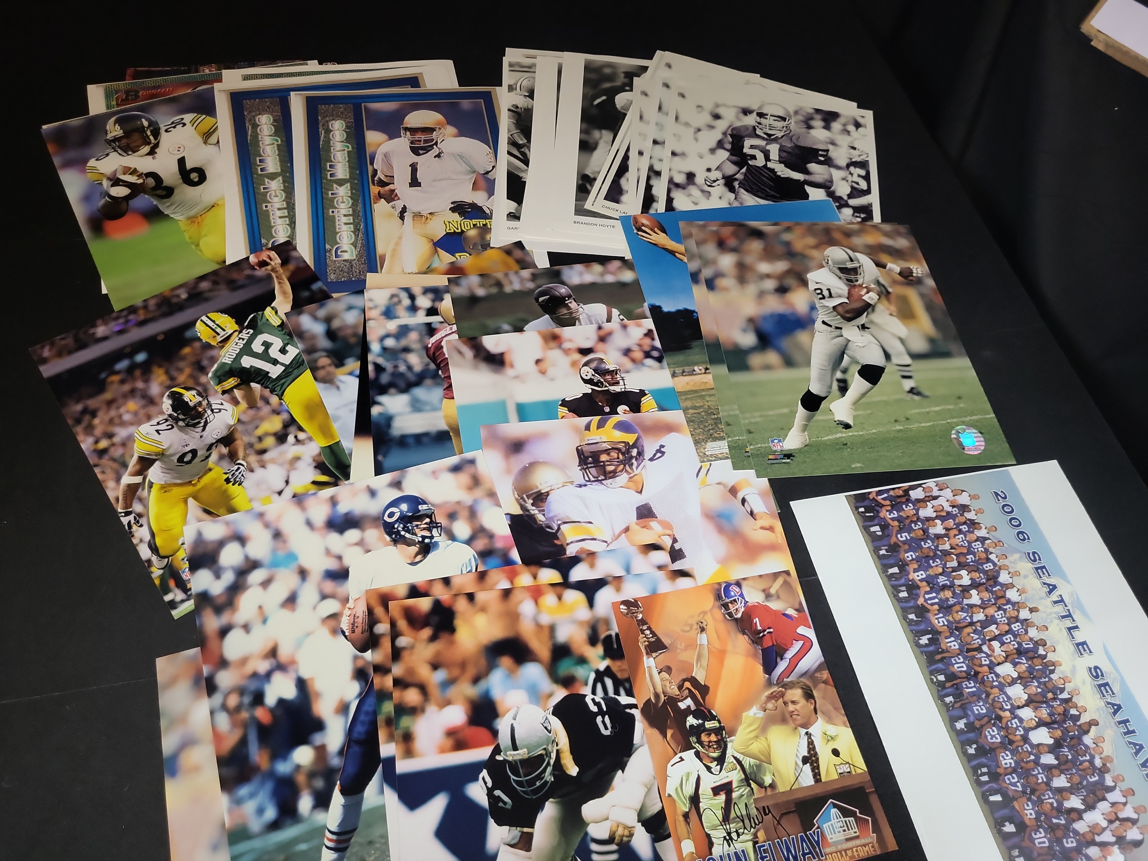I03040 | A Collection of Professional Sports Photographs Lithographs and Promotional Prints