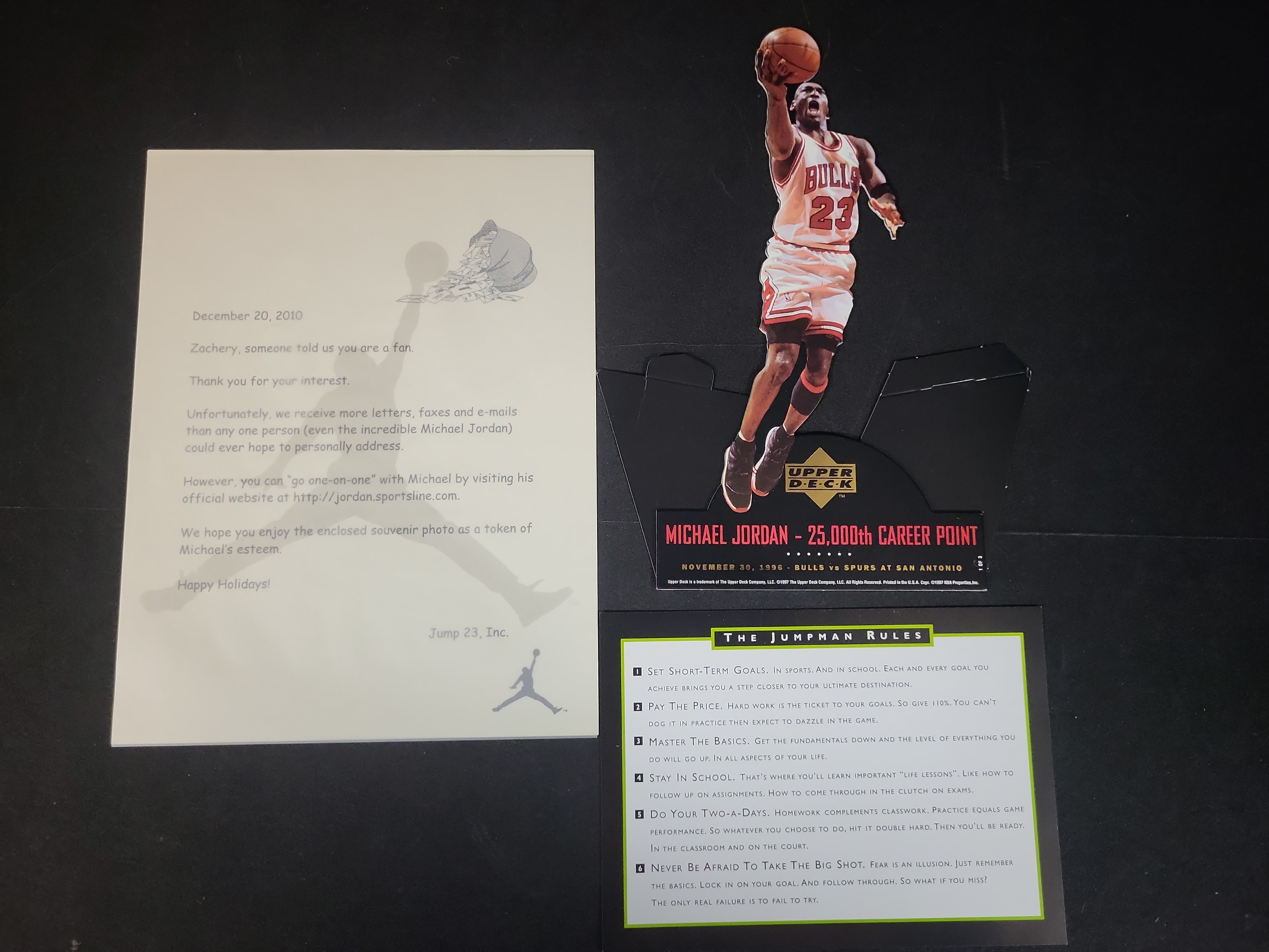 I03028 | A Trio of Michael Jordan Memorabilia Including a 1997 Upper Deck Commemorative Standee and Jump 23, Inc. Fan Correspondence
