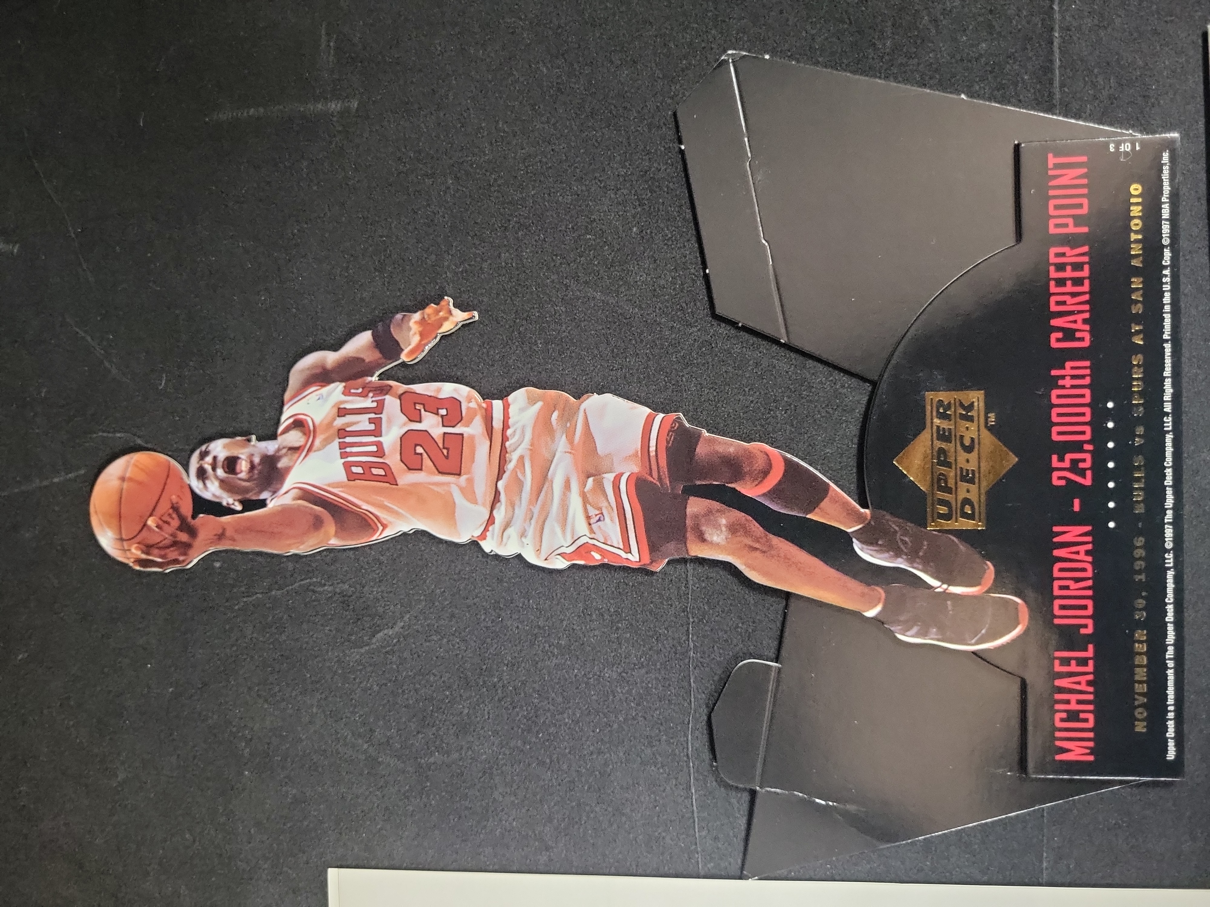 I03028 | A Trio of Michael Jordan Memorabilia Including a 1997 Upper Deck Commemorative Standee and Jump 23, Inc. Fan Correspondence