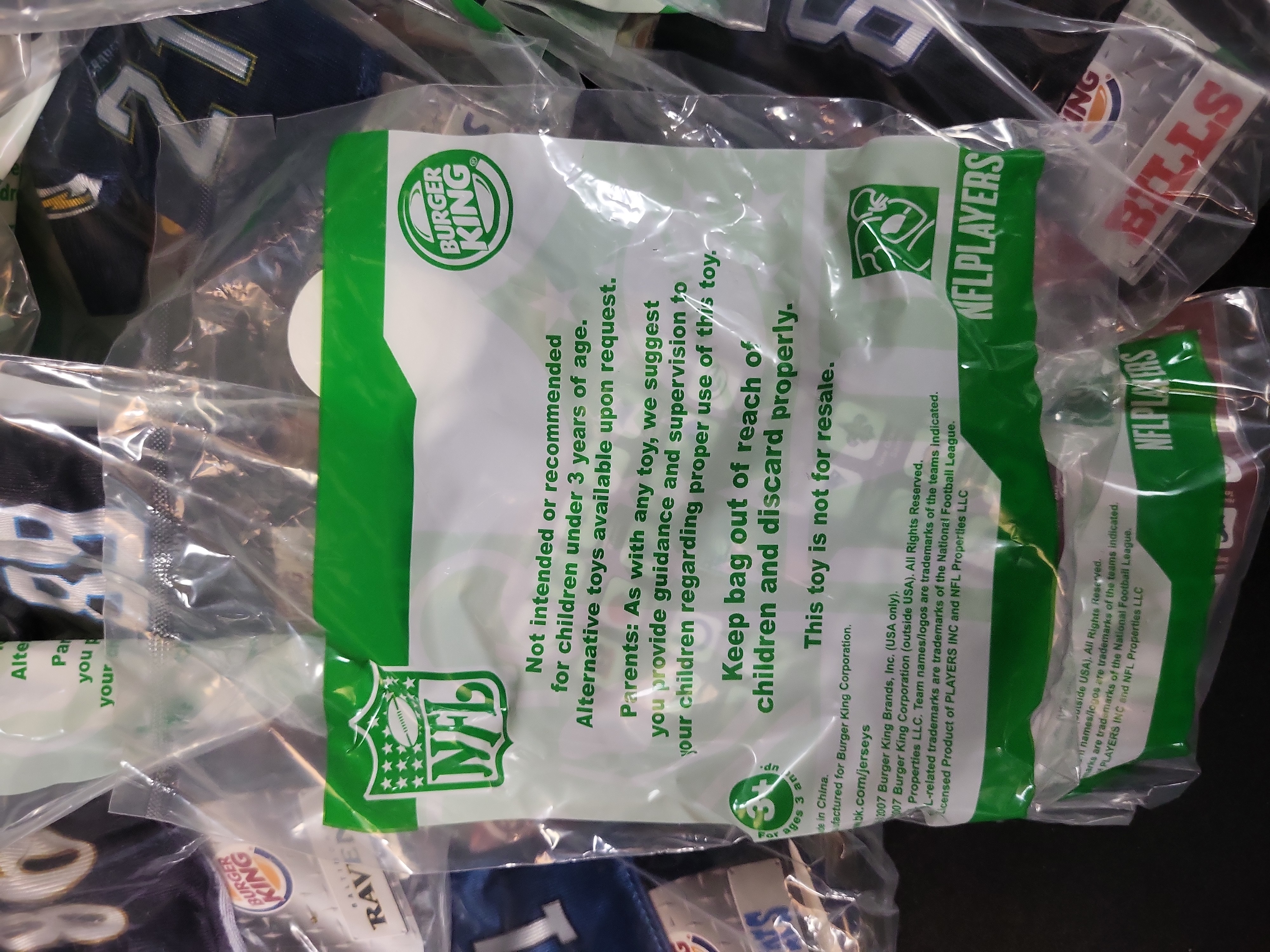 I03237 | A Collection of 2007 Burger King NFL Mini Jerseys in Original Packaging