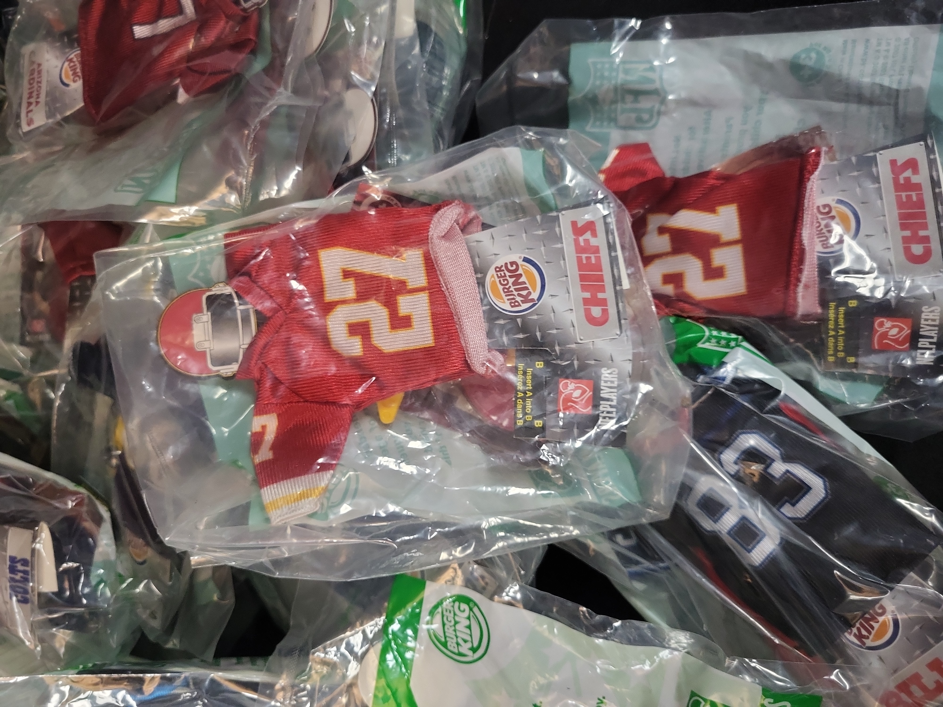 I03237 | A Collection of 2007 Burger King NFL Mini Jerseys in Original Packaging