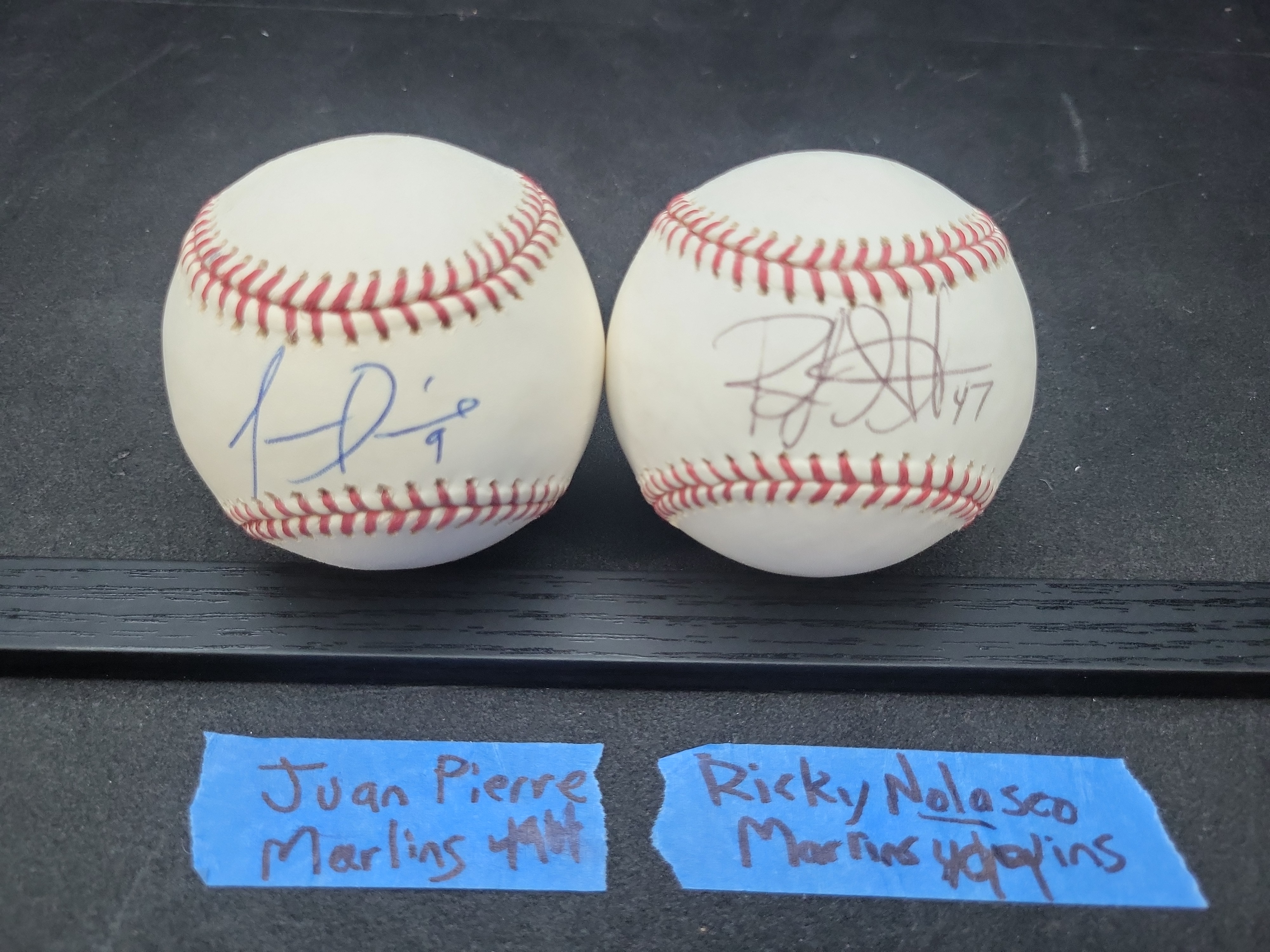 I03357 | A Pair of Florida Marlins Autographed Baseballs, Juan Pierre and Ricky Nolasco