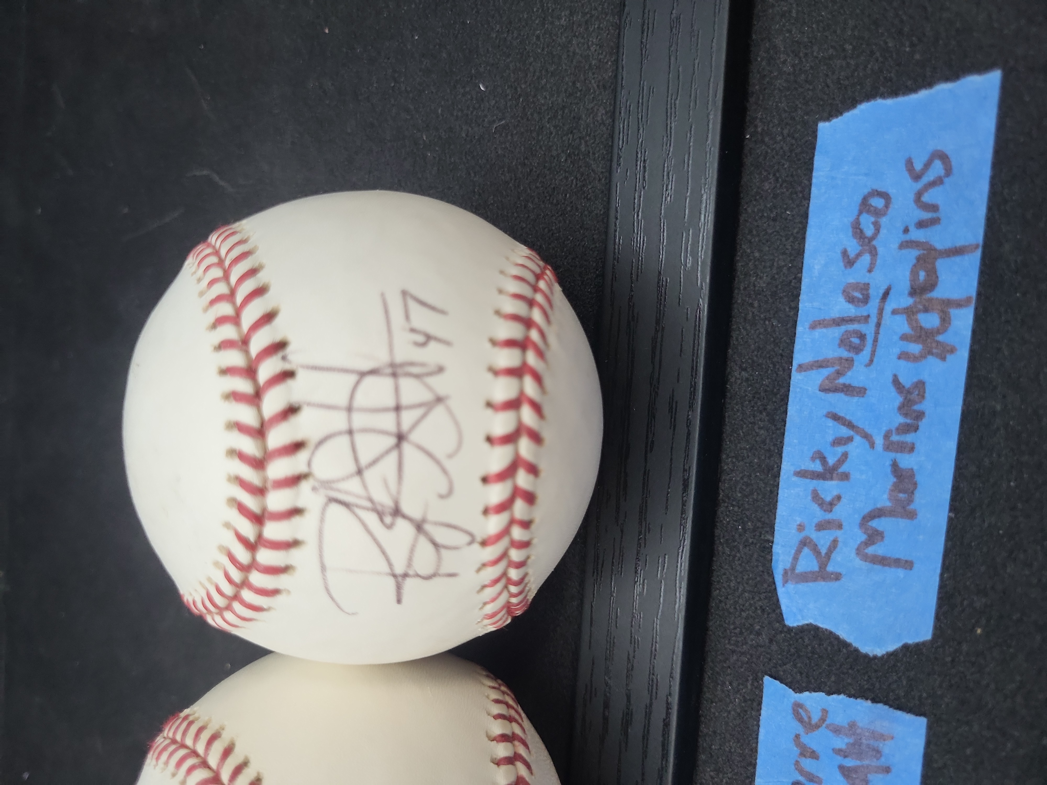 I03357 | A Pair of Florida Marlins Autographed Baseballs, Juan Pierre and Ricky Nolasco