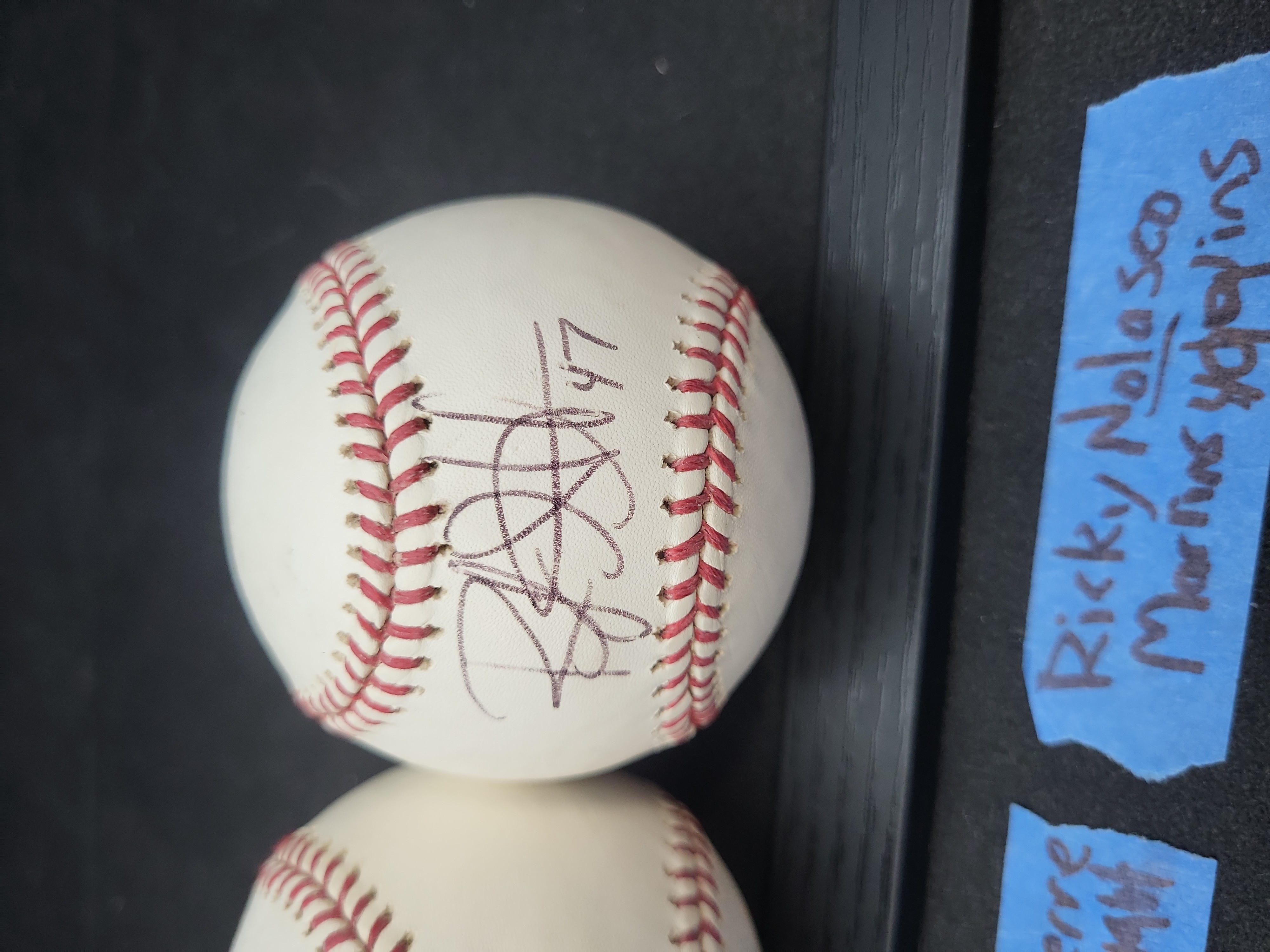 I03357 | A Pair of Florida Marlins Autographed Baseballs, Juan Pierre and Ricky Nolasco