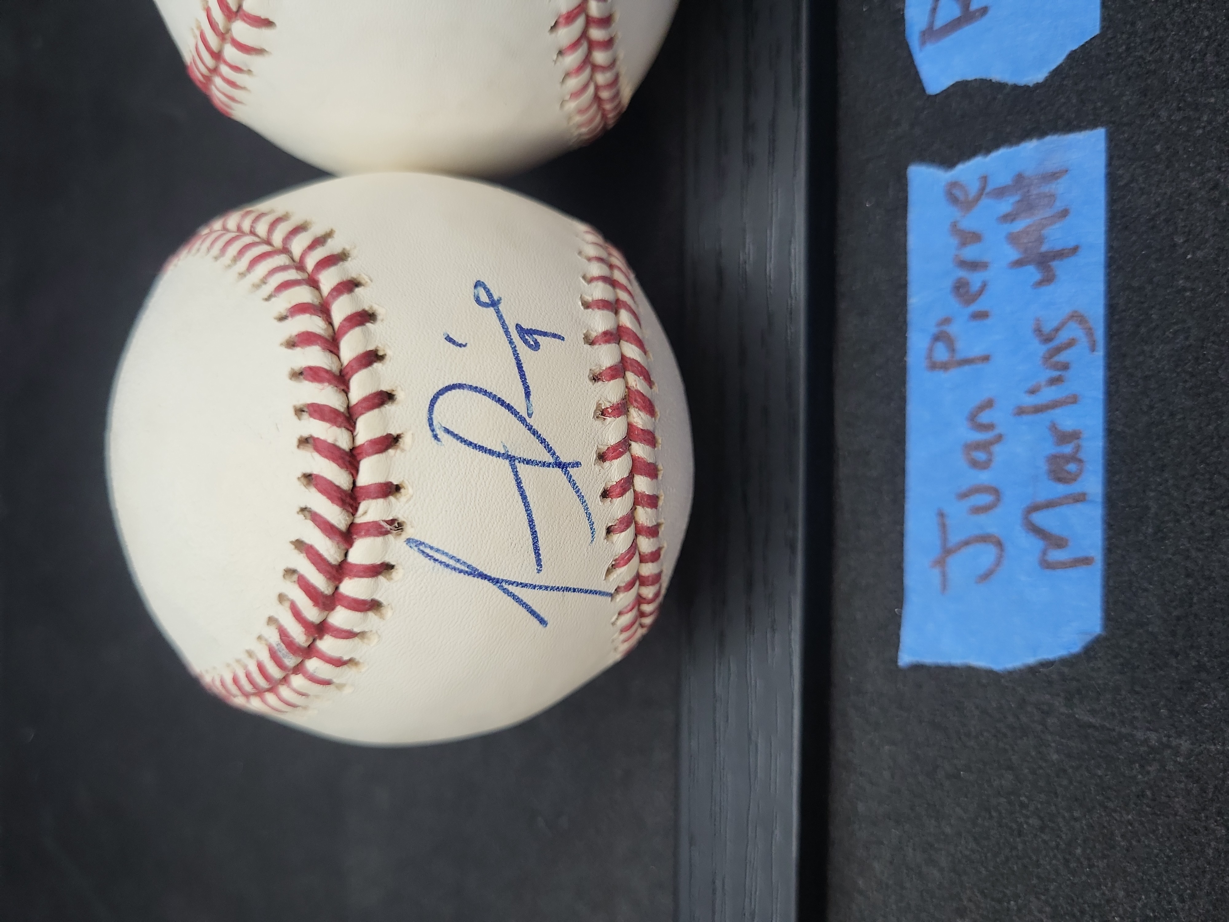 I03357 | A Pair of Florida Marlins Autographed Baseballs, Juan Pierre and Ricky Nolasco