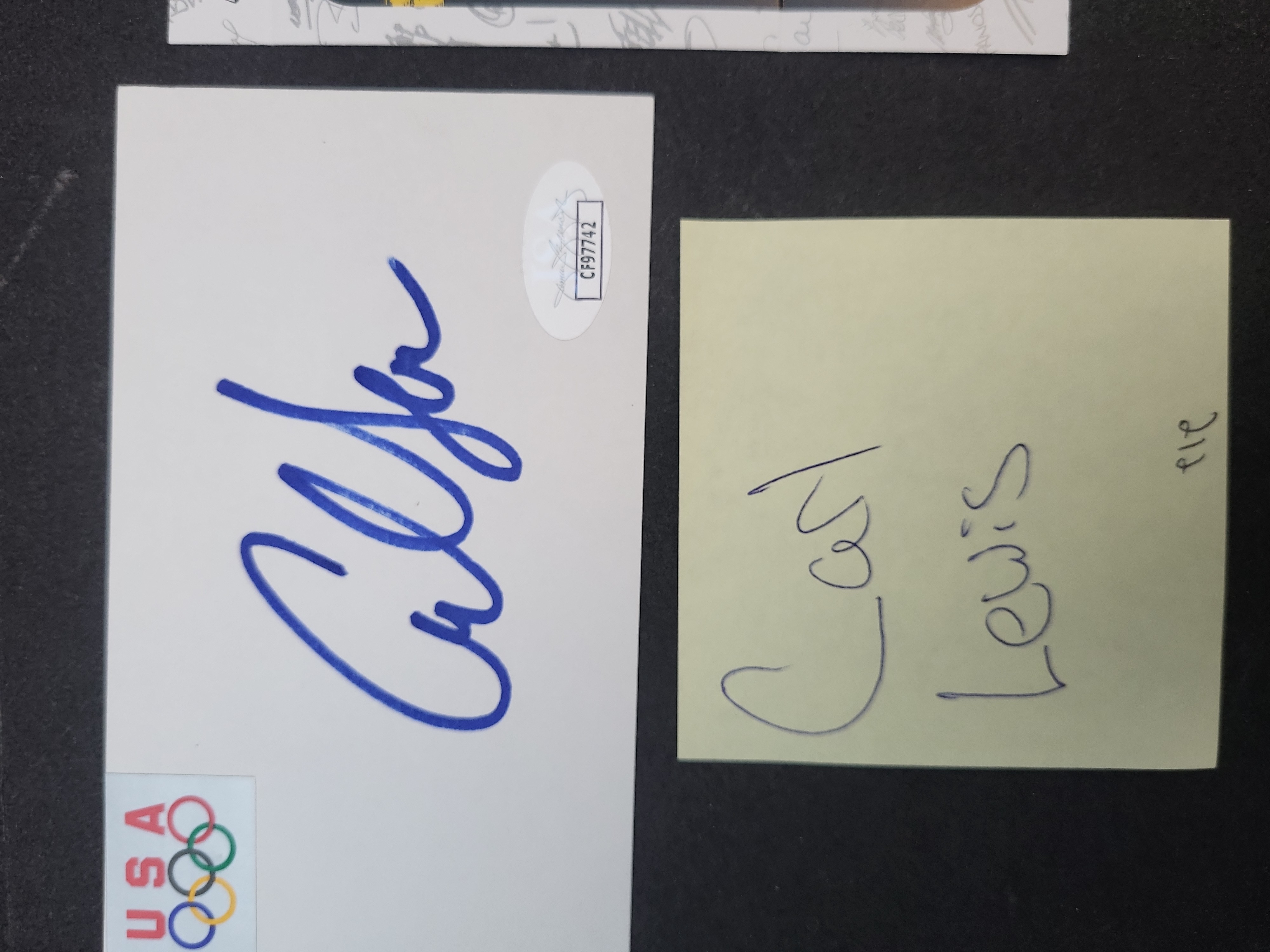 I03378 | Carl Lewis Autographed Team USA Olympic Card with JSA Authentication