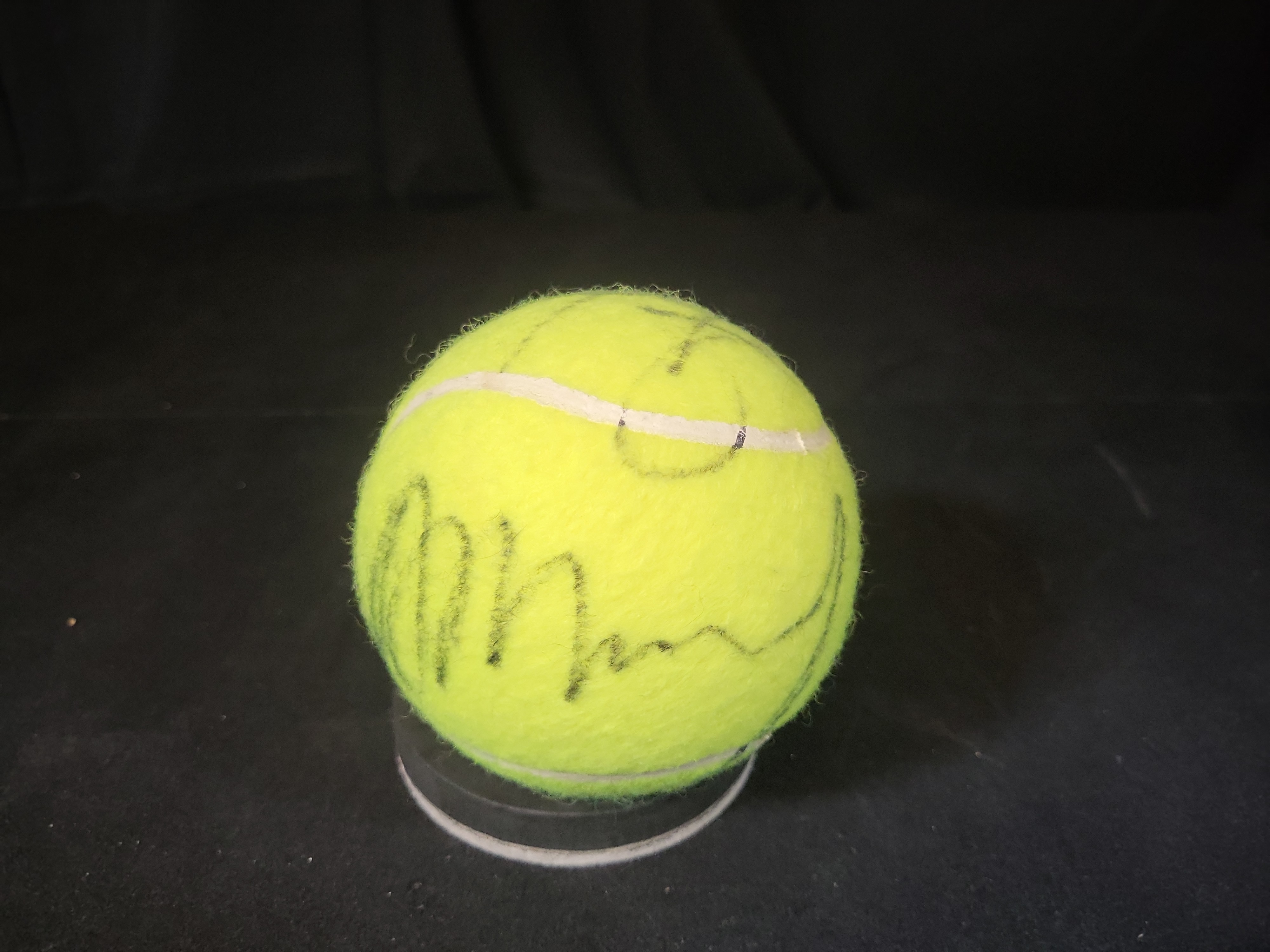 I03239 | Autographed Tennis Ball with Holabird Sports Logo and Display Stand