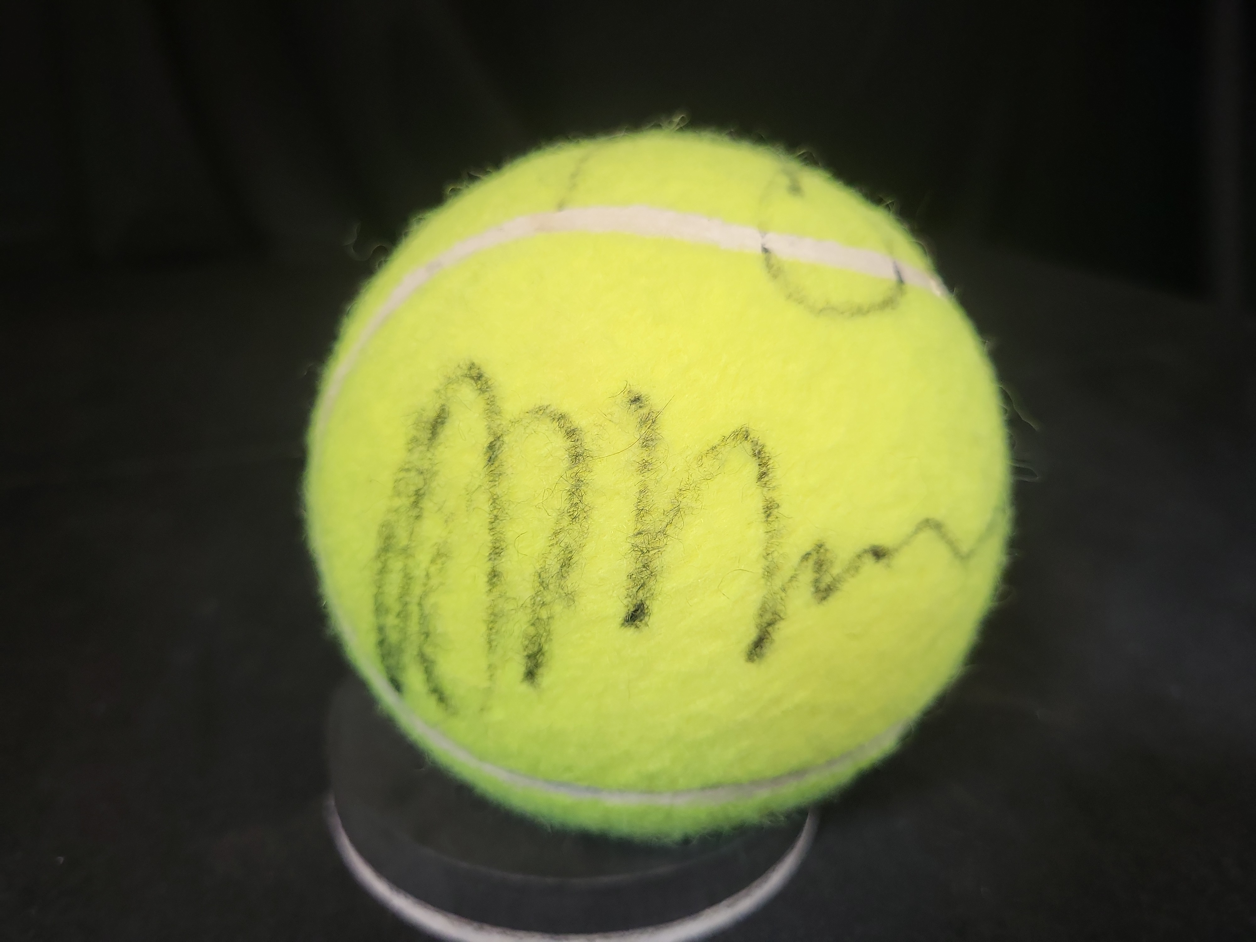 I03239 | Autographed Tennis Ball with Holabird Sports Logo and Display Stand