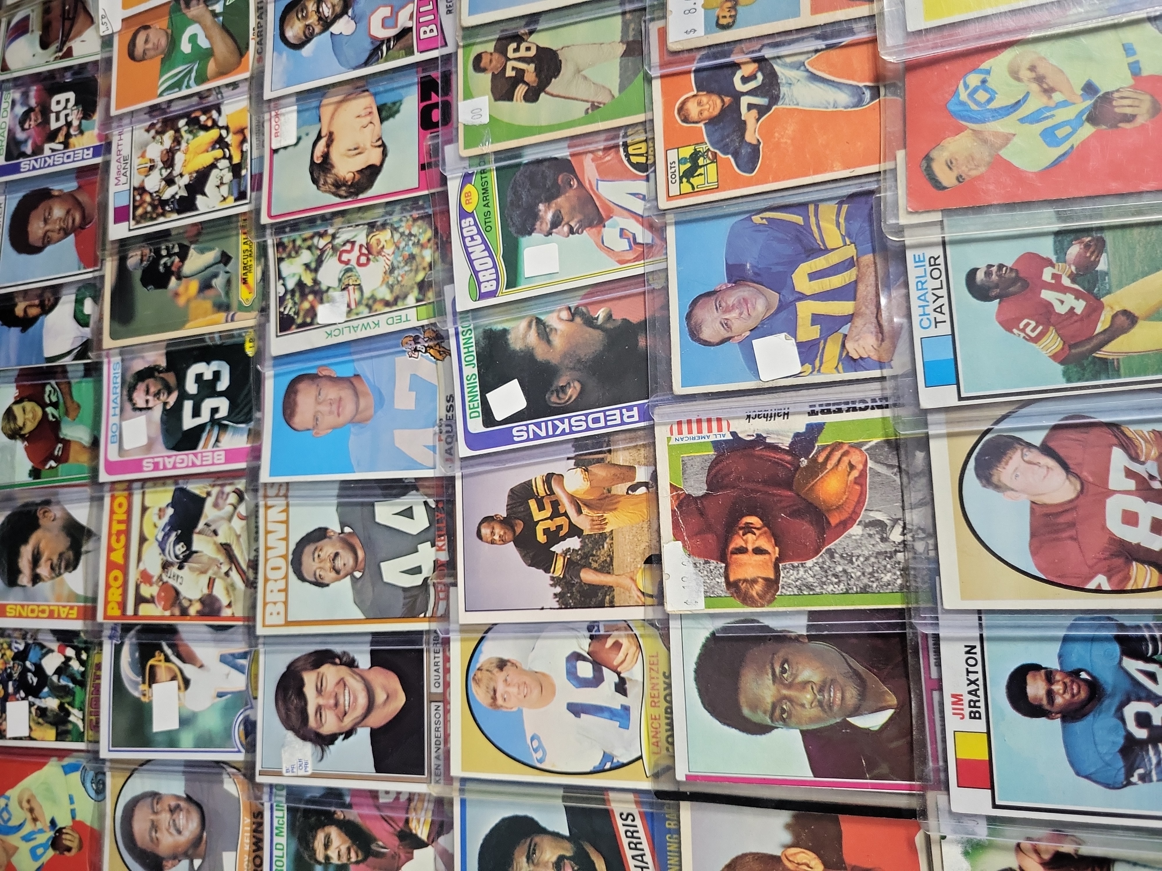 I03843 | A Collection of Vintage Topps American Football Trading Cards Including 1955 All-American and Rookie Cards