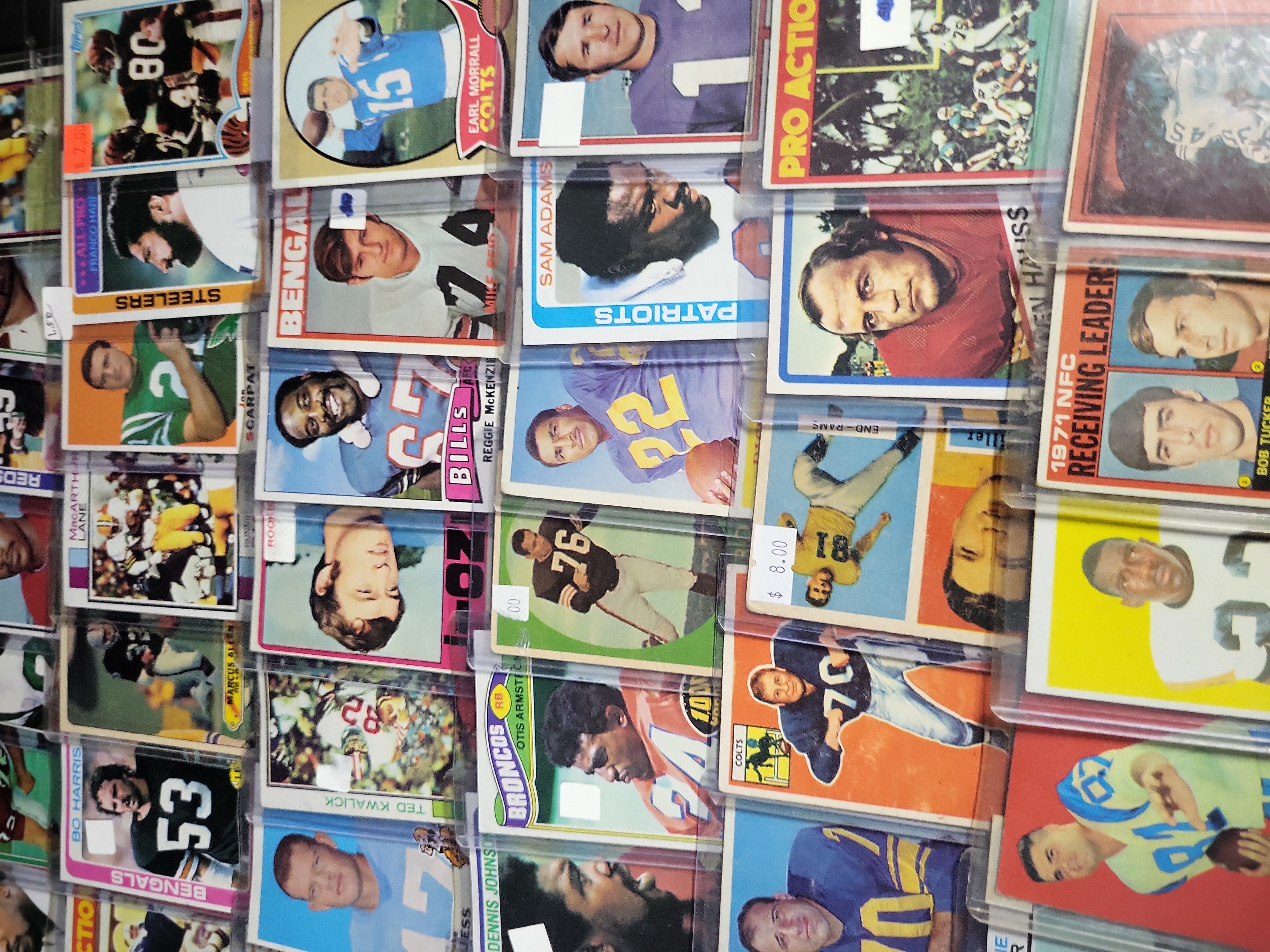 I03843 | A Collection of Vintage Topps American Football Trading Cards Including 1955 All-American and Rookie Cards