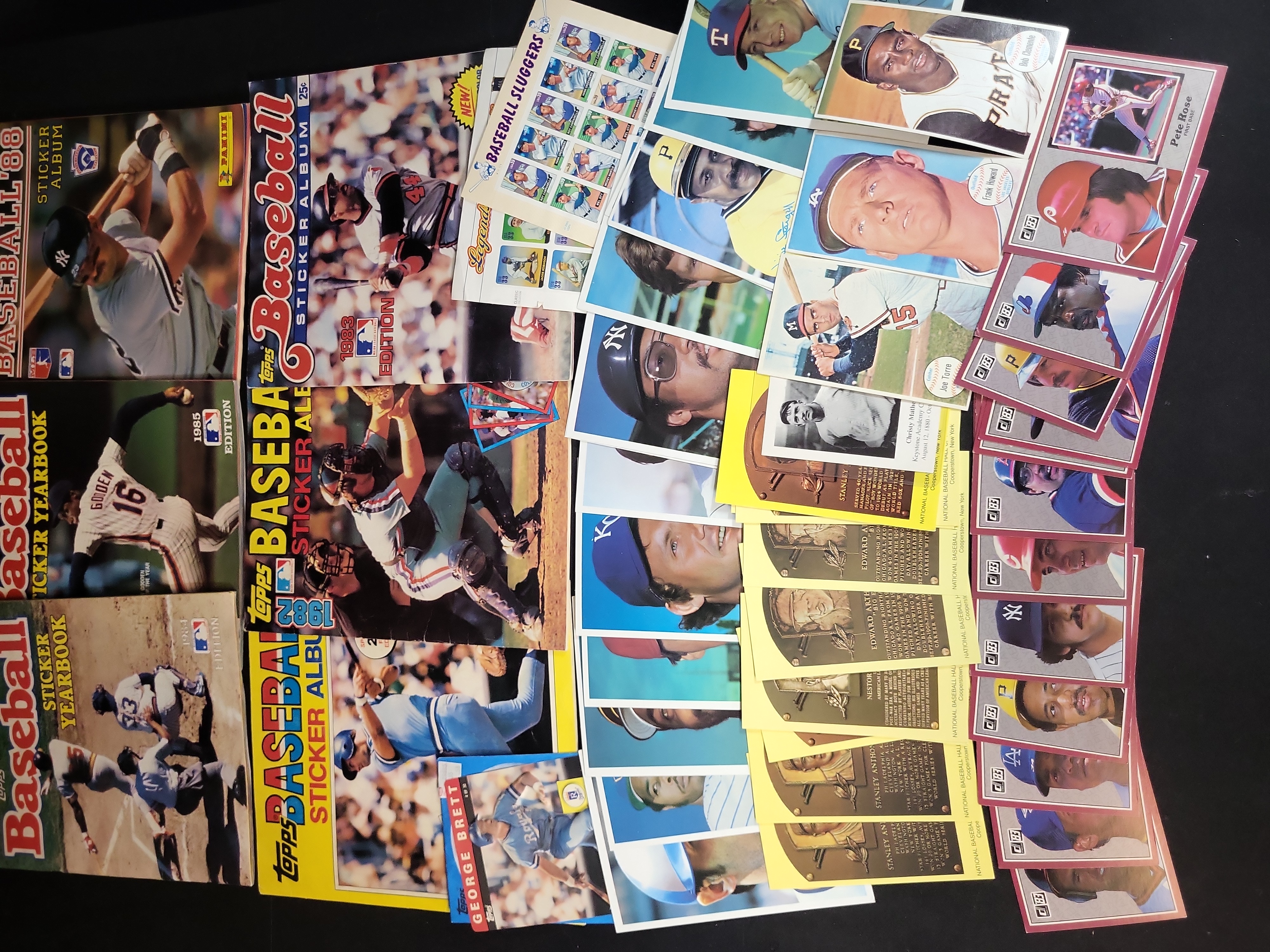 I03079 | An Assortment of Vintage Baseball Cards, Sticker Albums, and Memorabilia