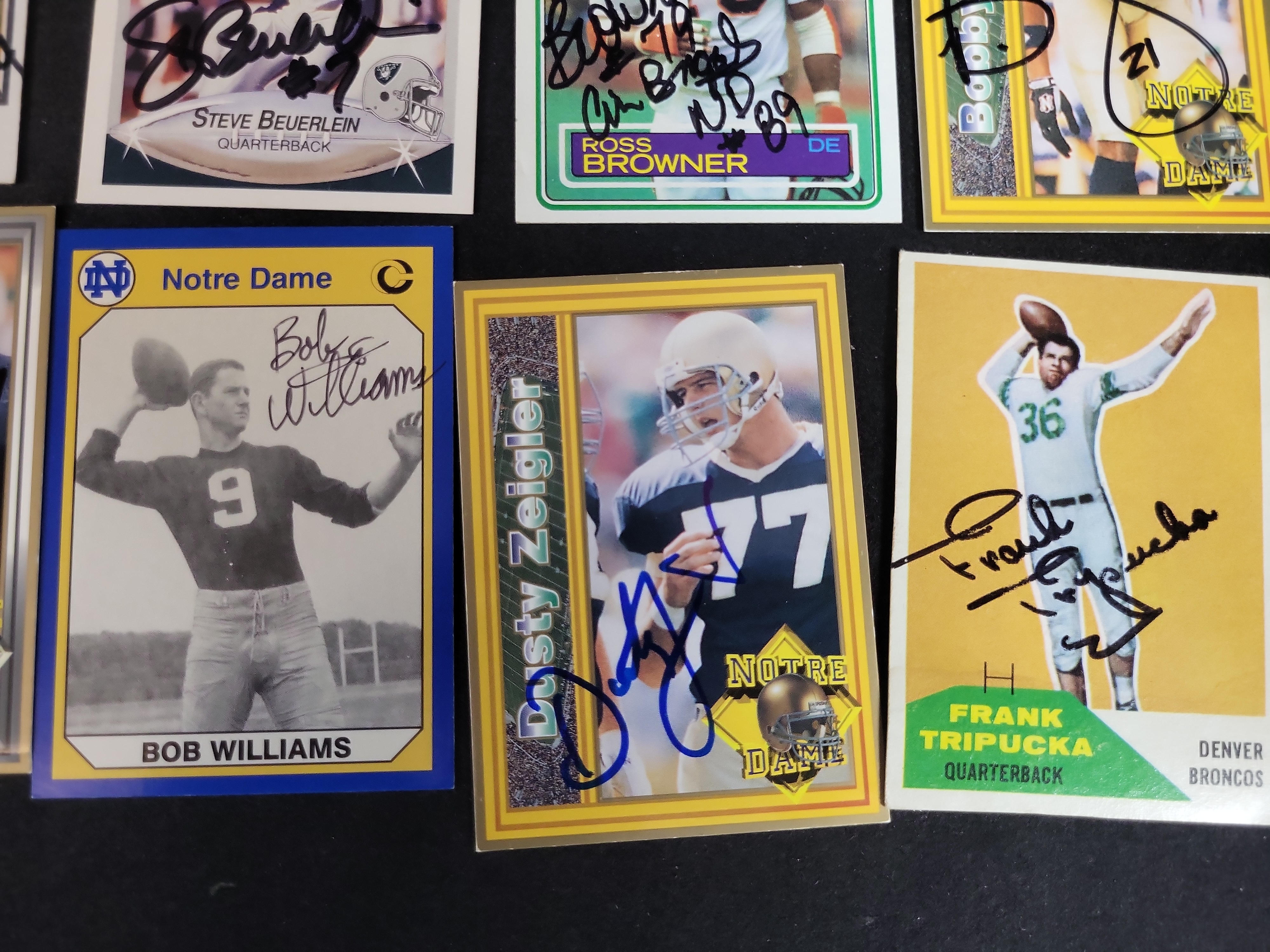 I03083 | A Collection of 24 Autographed Professional and Collegiate Football Trading Cards