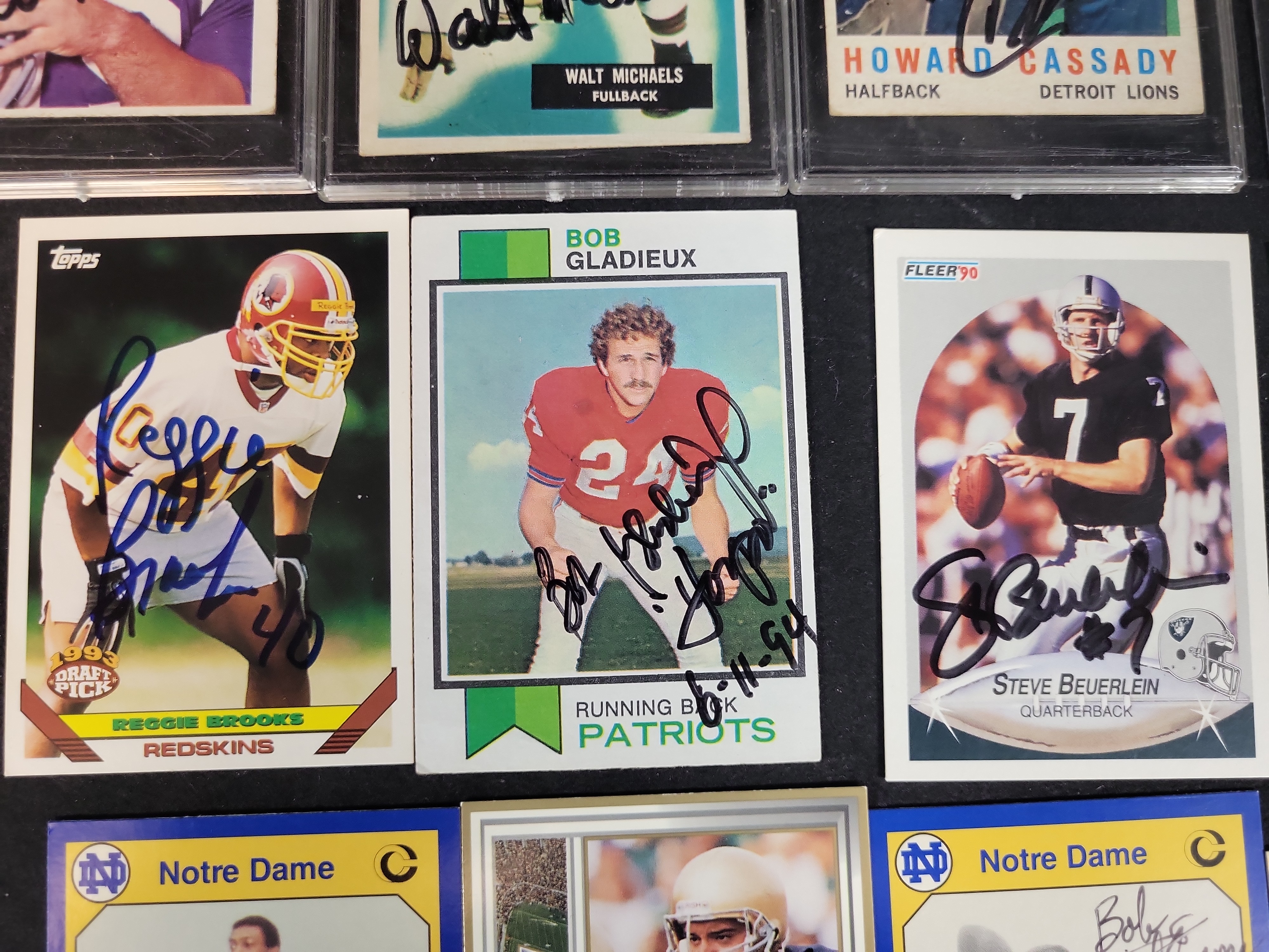 I03083 | A Collection of 24 Autographed Professional and Collegiate Football Trading Cards