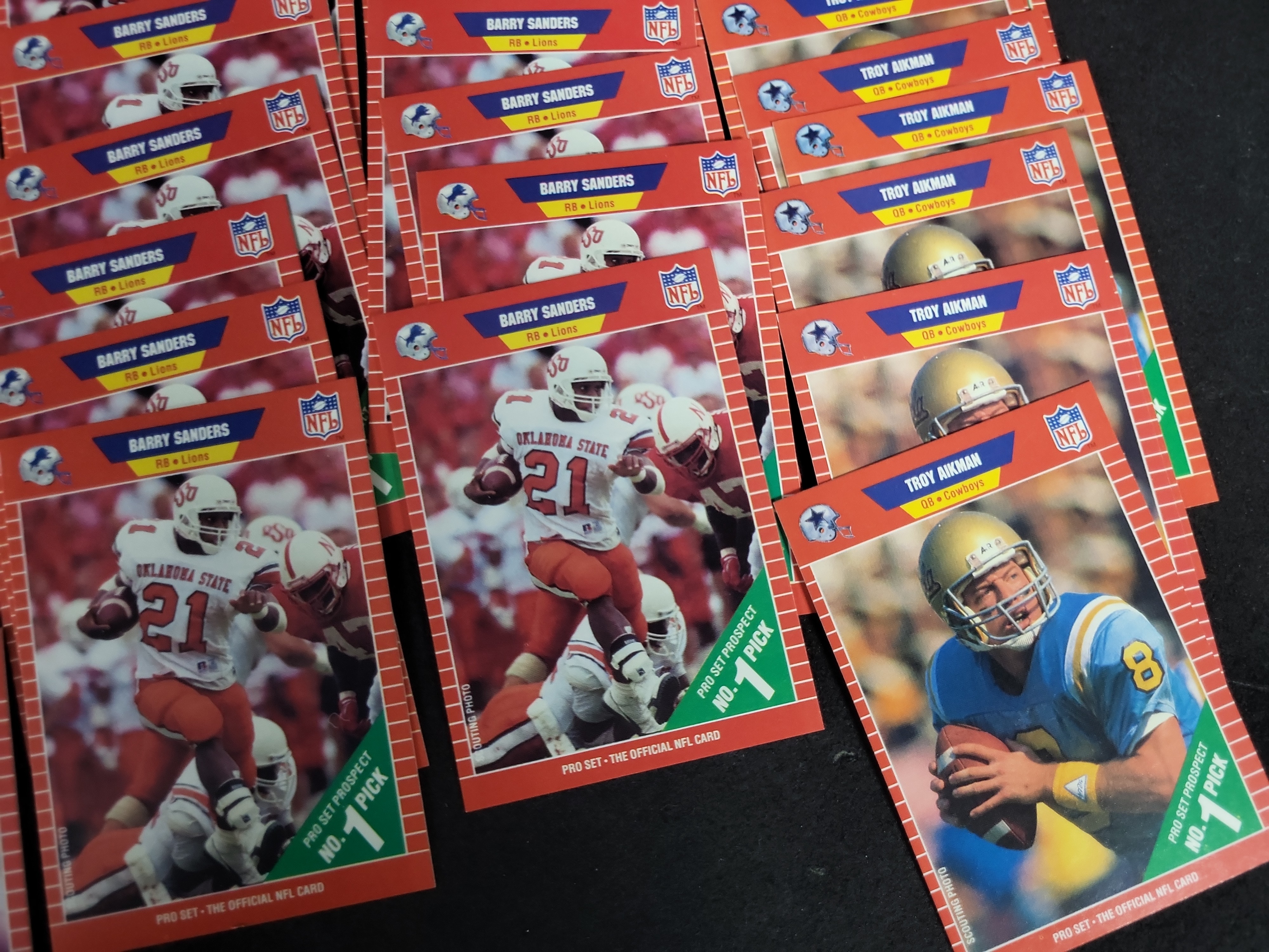 I03203 | Collection of 1989 Pro Set Football Rookie Cards featuring Barry Sanders, Troy Aikman, and Deion Sanders