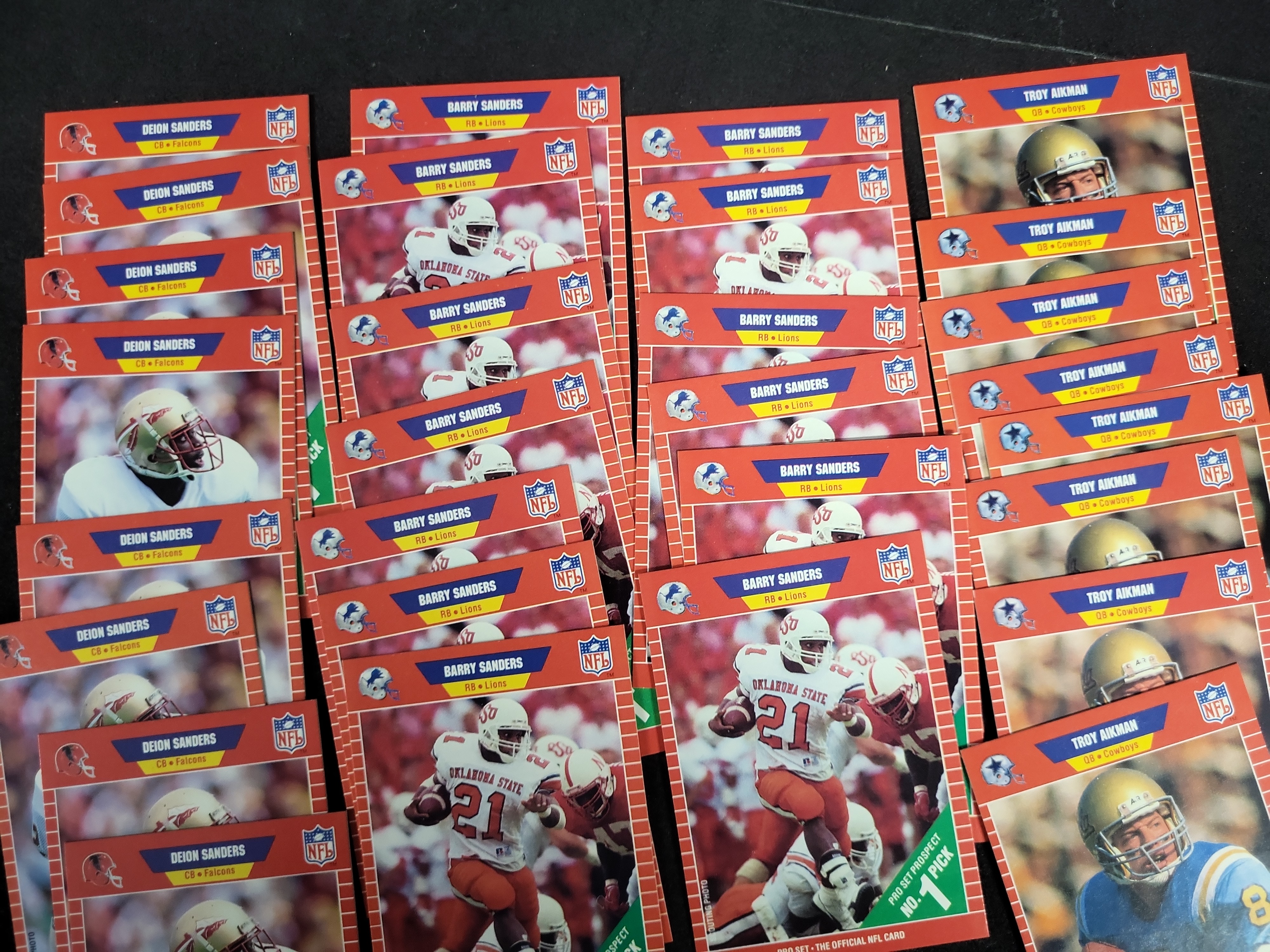I03203 | Collection of 1989 Pro Set Football Rookie Cards featuring Barry Sanders, Troy Aikman, and Deion Sanders