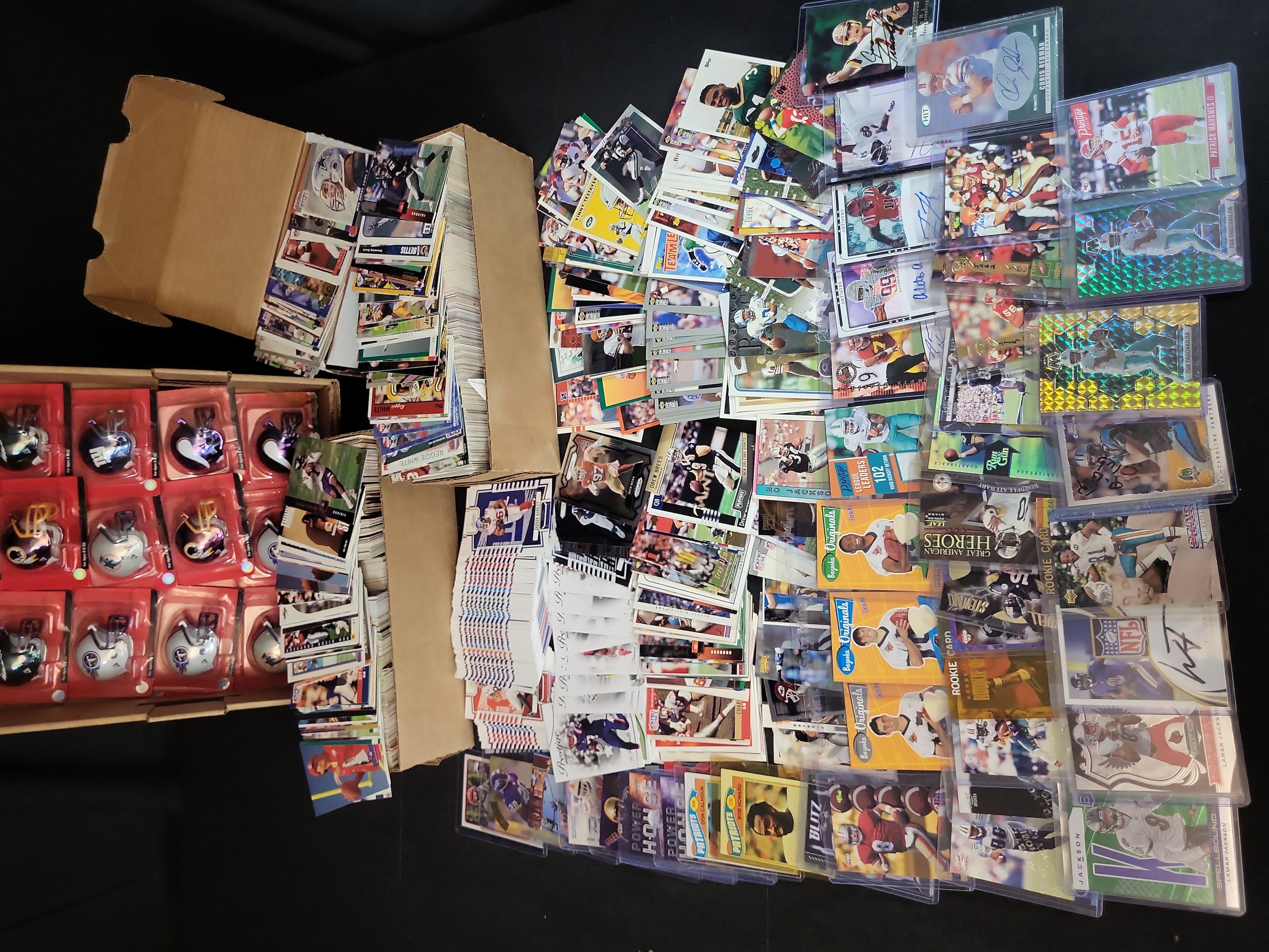 I03650 | An Assortment of Professional Football Trading Cards and Riddell Pocket Pro Helmets Late 1980s to 2023