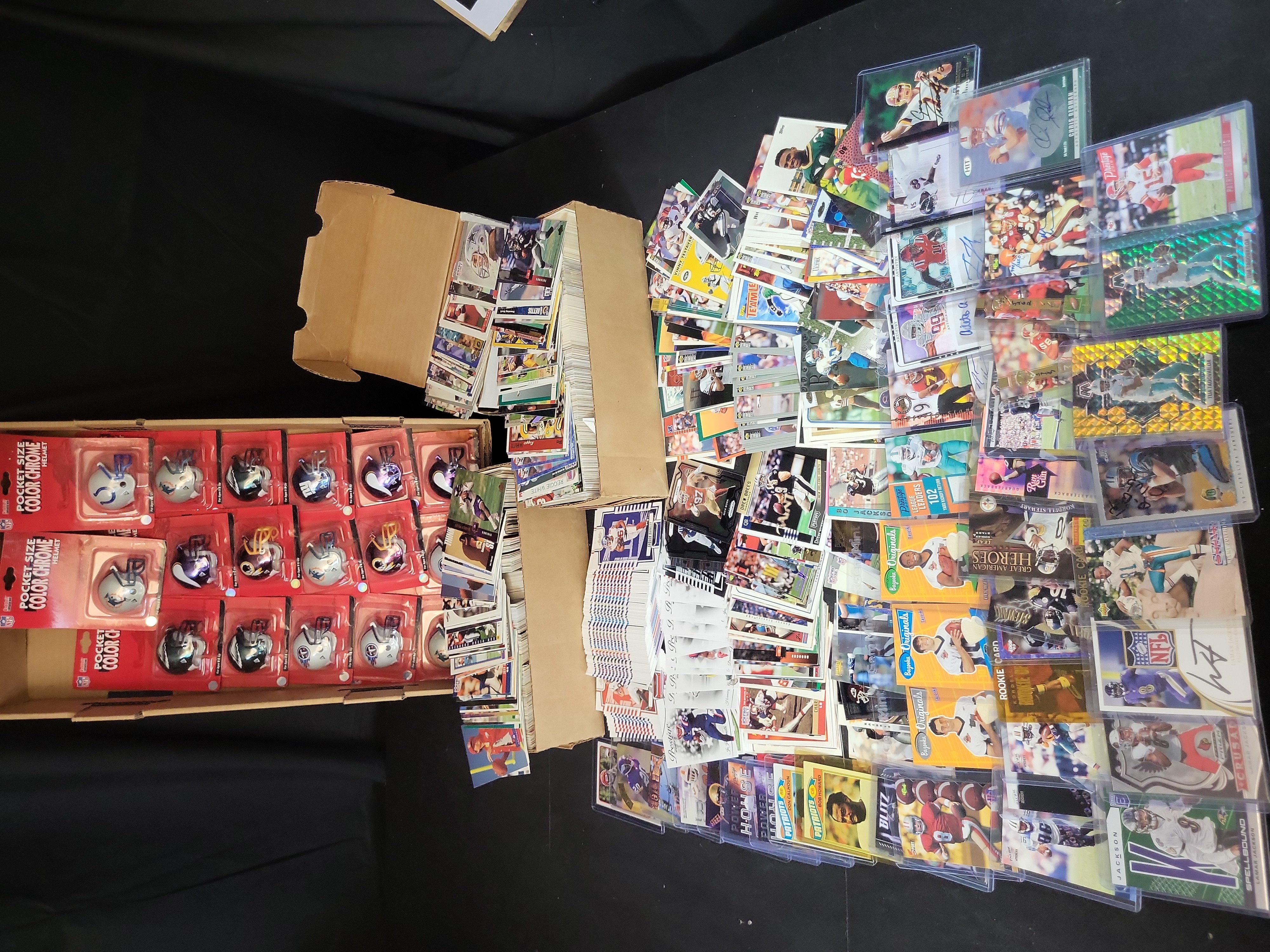 I03650 | An Assortment of Professional Football Trading Cards and Riddell Pocket Pro Helmets Late 1980s to 2023