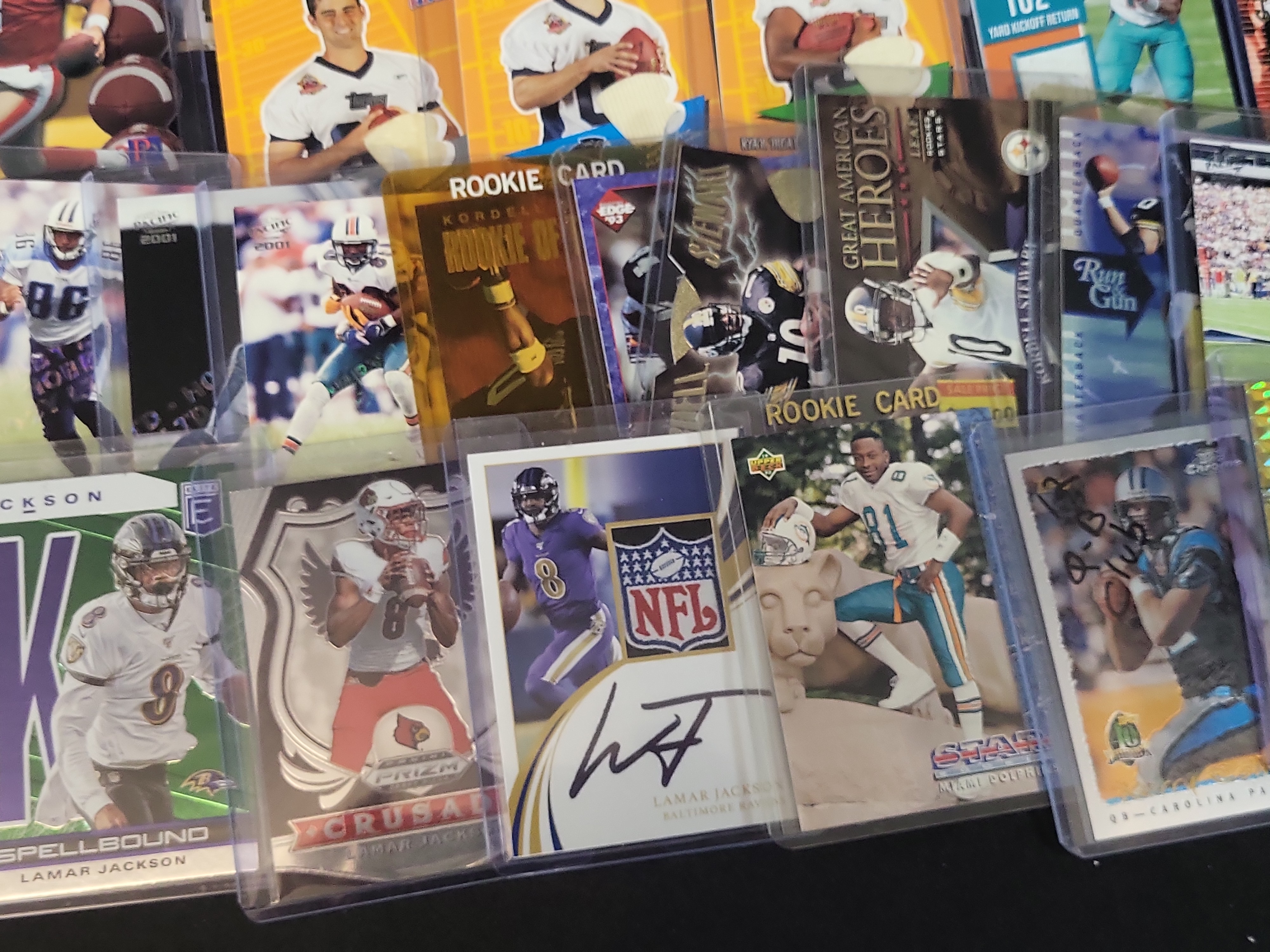 I03650 | An Assortment of Professional Football Trading Cards and Riddell Pocket Pro Helmets Late 1980s to 2023