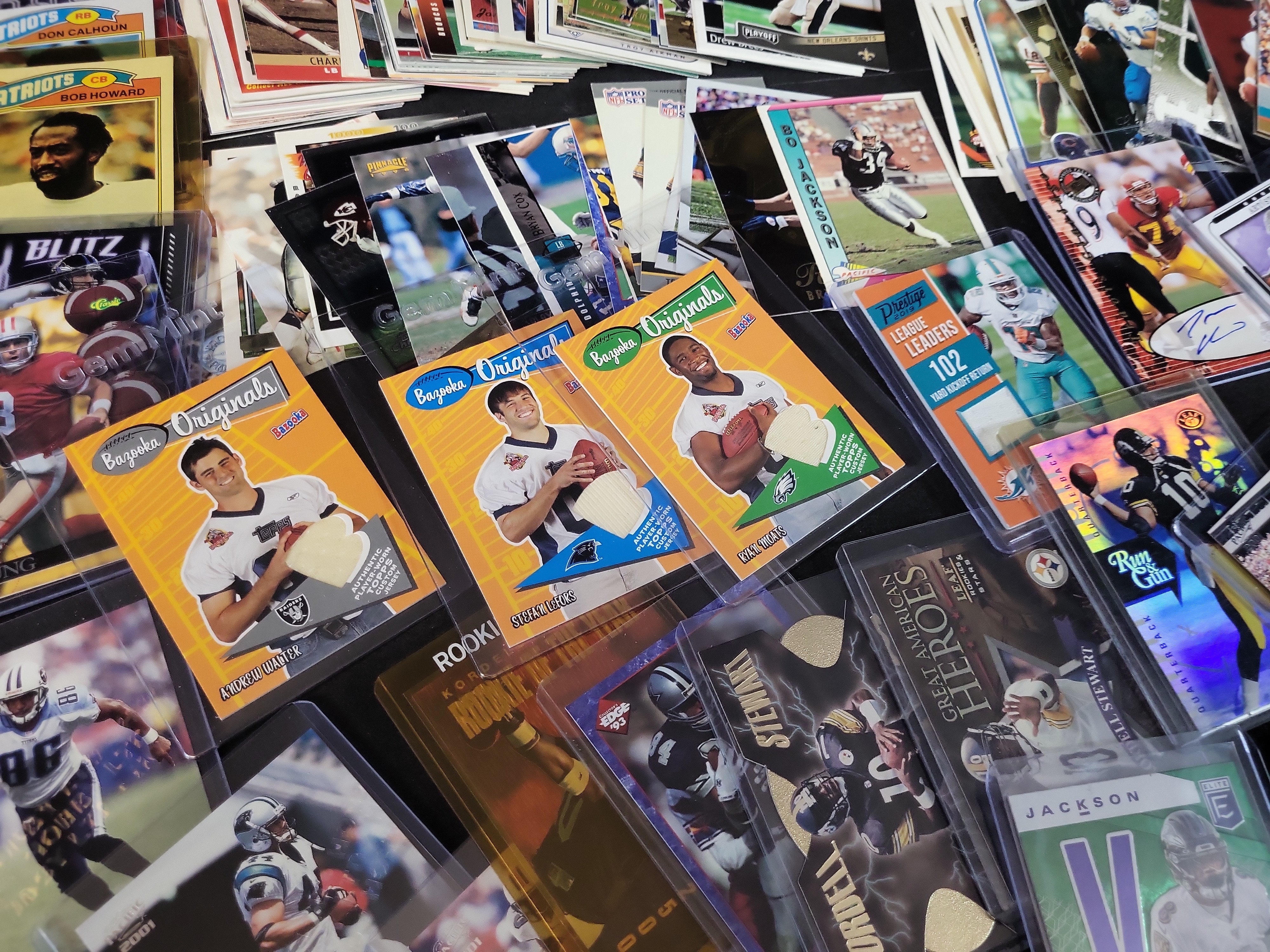I03650 | An Assortment of Professional Football Trading Cards and Riddell Pocket Pro Helmets Late 1980s to 2023