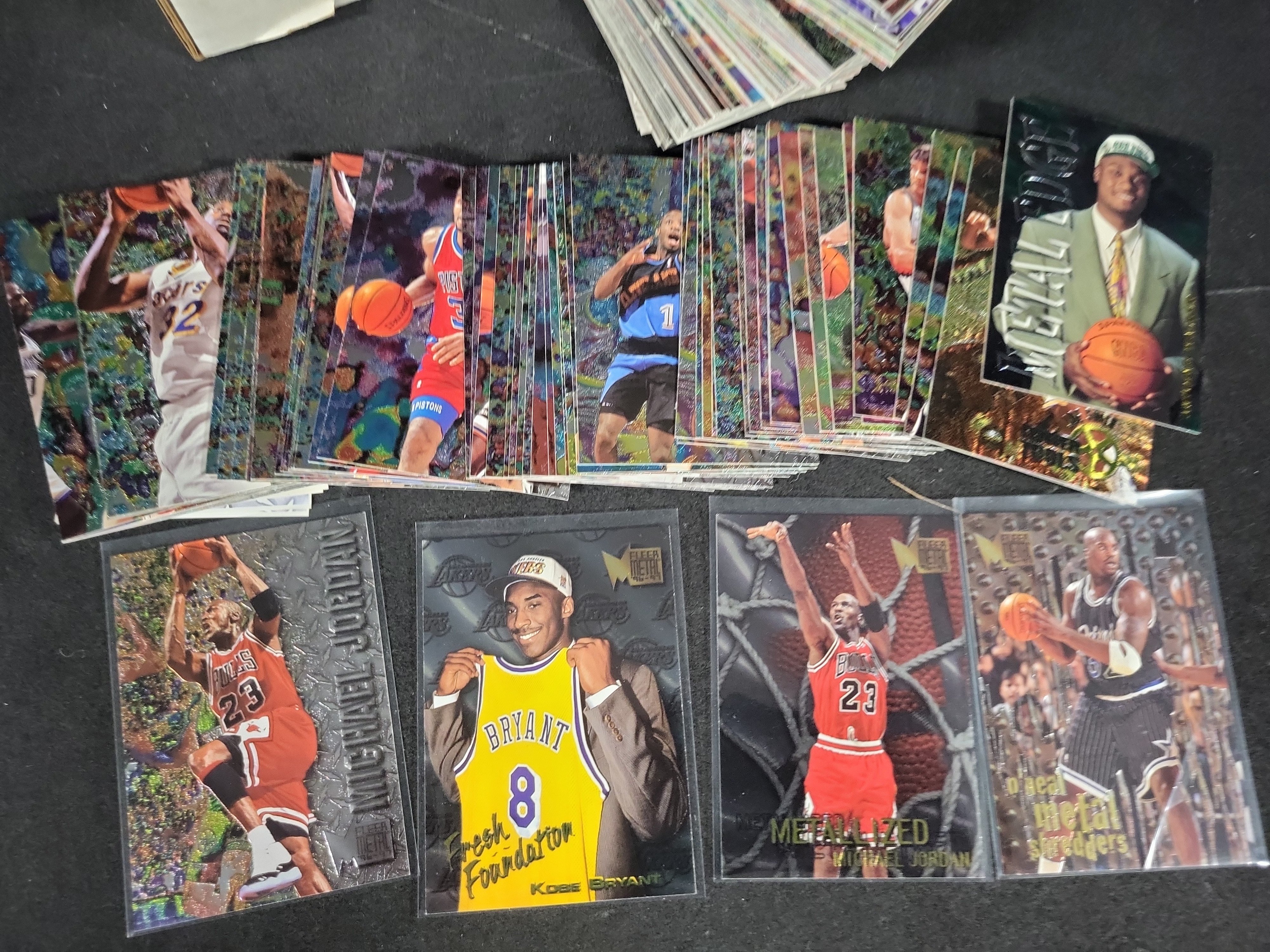 I03805 | A Collection of 1996-97 Fleer Metal Basketball Trading Cards Featuring Michael Jordan and Kobe Bryant