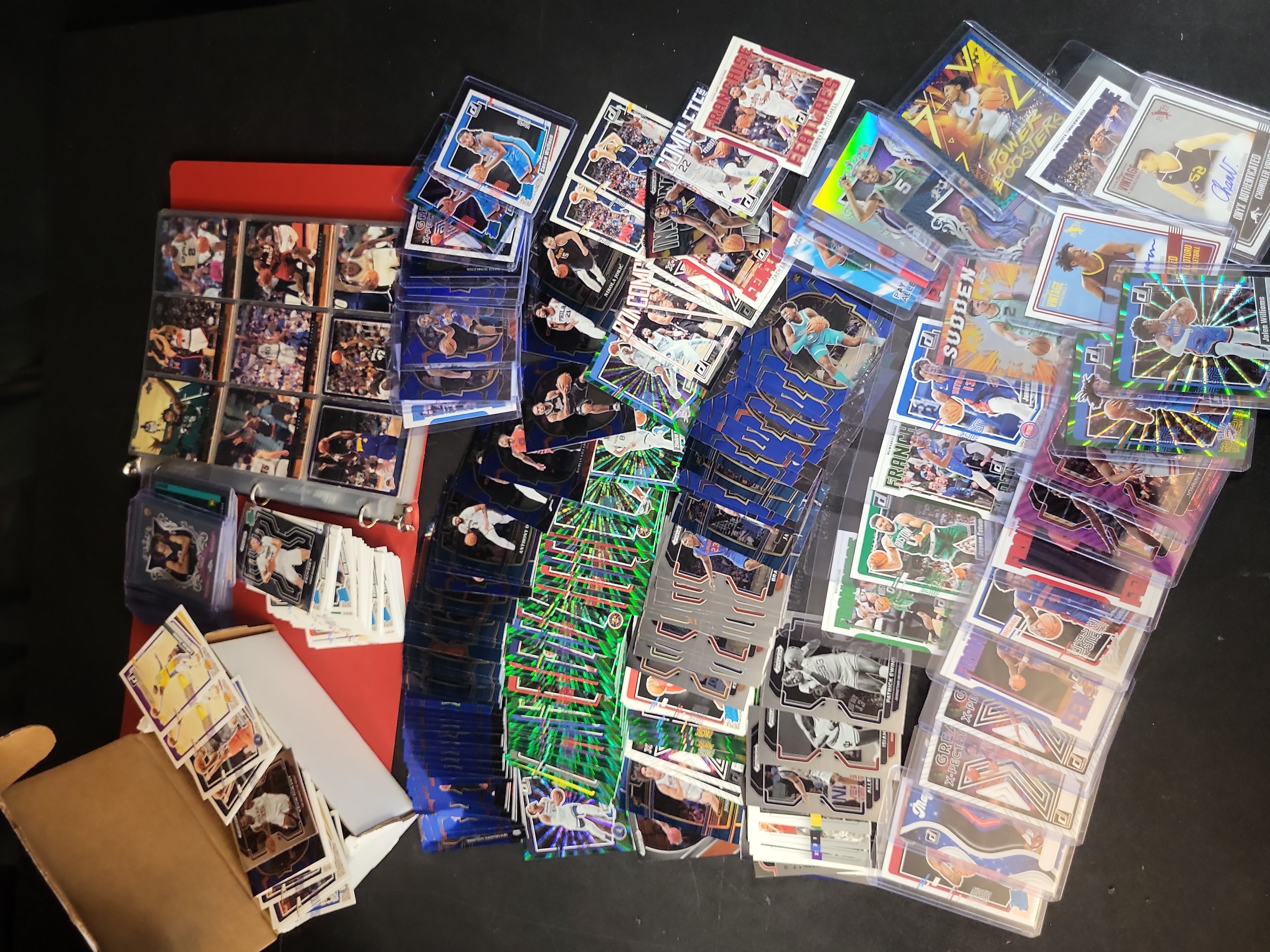I03648 | A Collection of NBA Trading Cards Featuring Modern Panini Parallels, Rookies, and 1999-2000 Upper Deck Binder