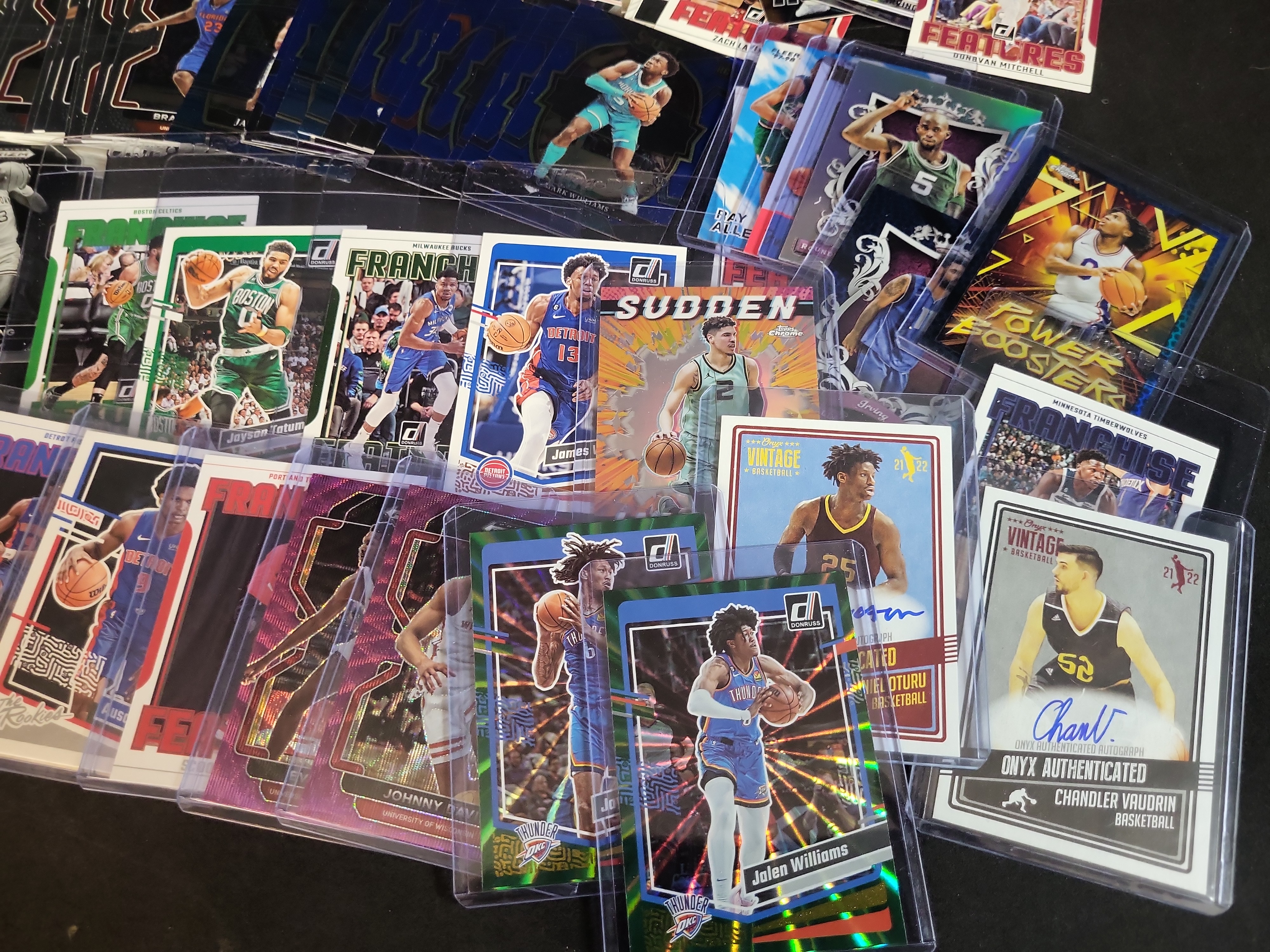 I03648 | A Collection of NBA Trading Cards Featuring Modern Panini Parallels, Rookies, and 1999-2000 Upper Deck Binder
