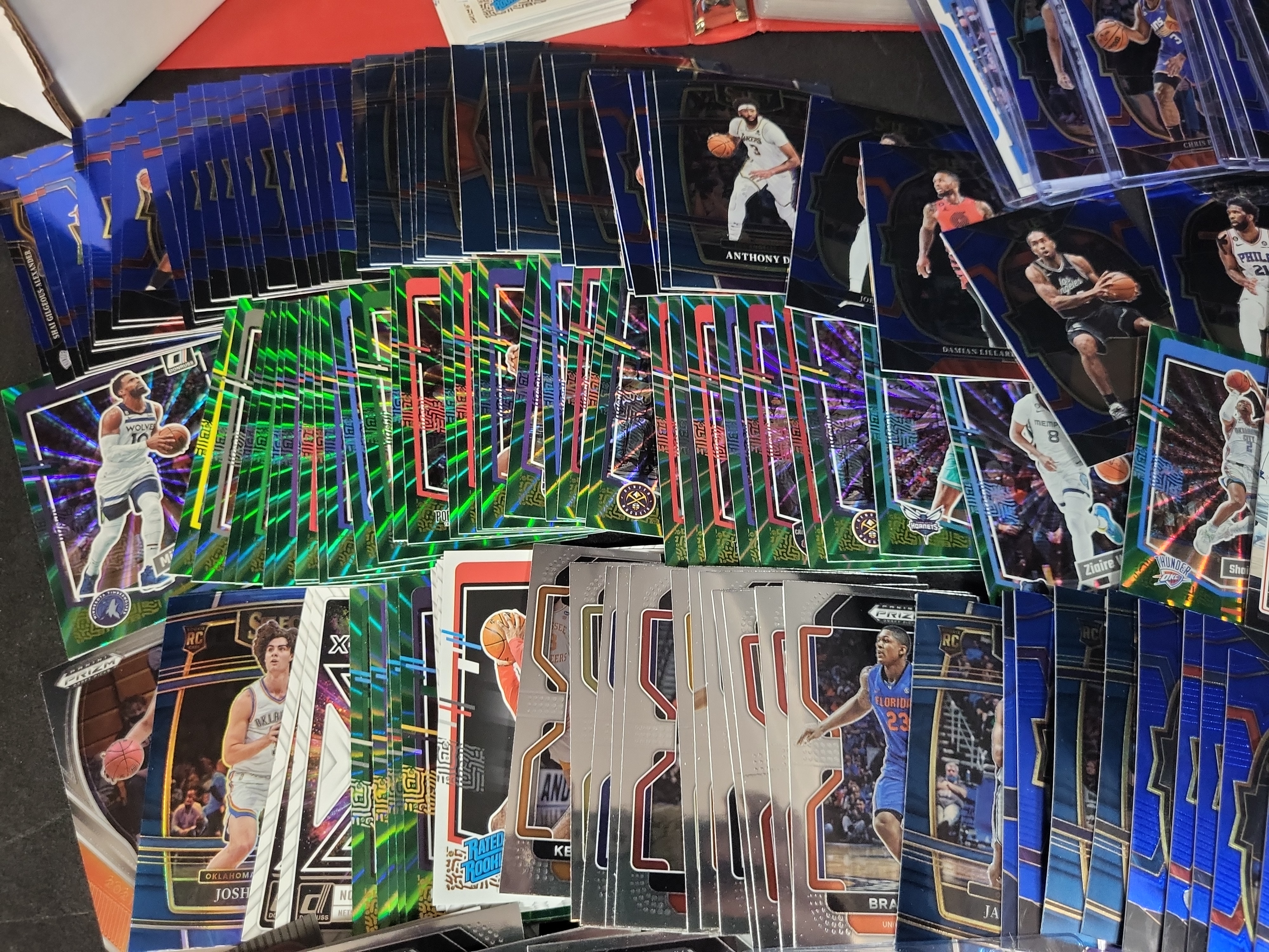 I03648 | A Collection of NBA Trading Cards Featuring Modern Panini Parallels, Rookies, and 1999-2000 Upper Deck Binder