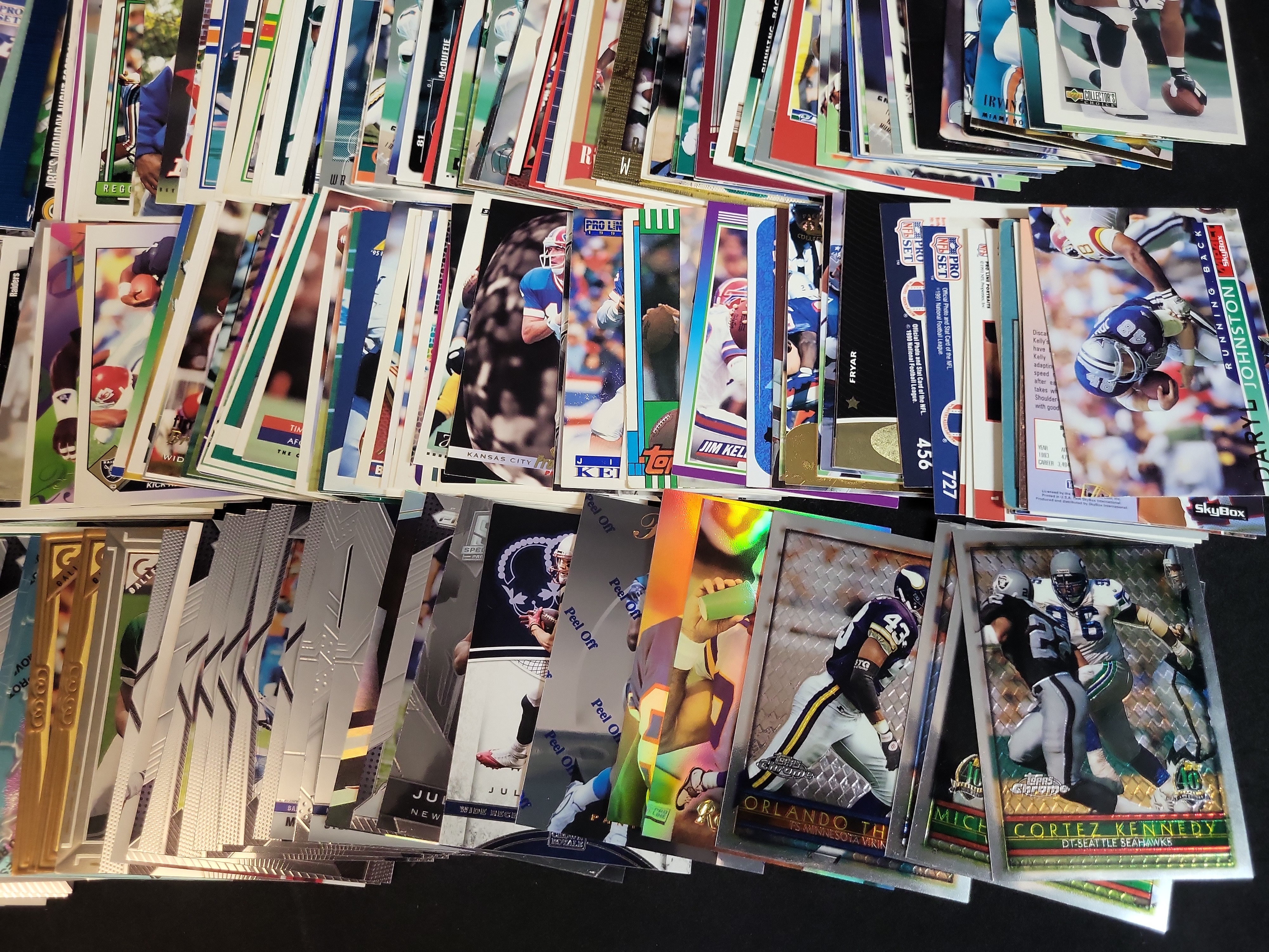 I03652 | An Assortment of Football Trading Cards Late 1980s to Mid 2000s Featuring Joe Montana Bo Jackson and Reggie White