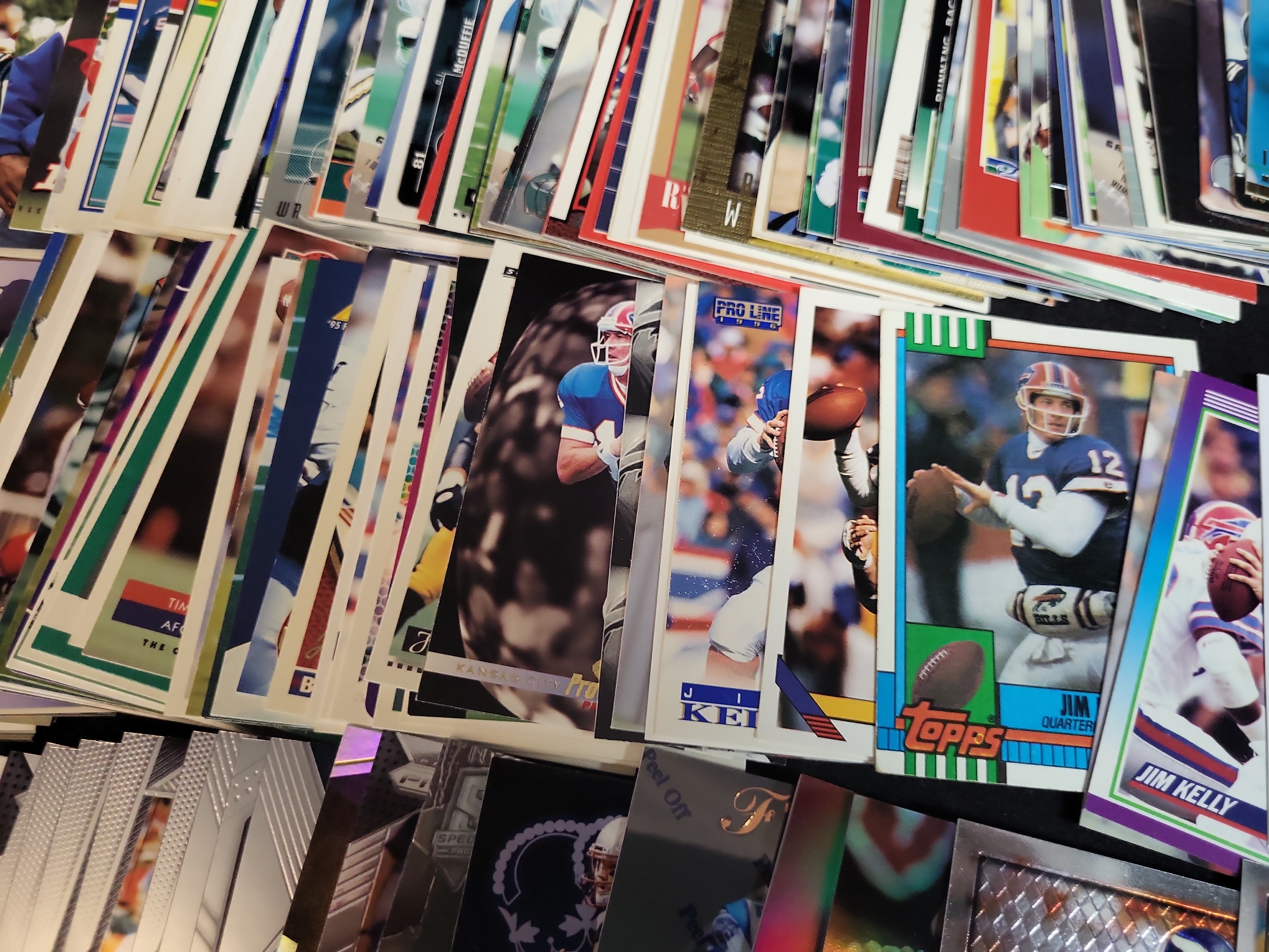 I03652 | An Assortment of Football Trading Cards Late 1980s to Mid 2000s Featuring Joe Montana Bo Jackson and Reggie White