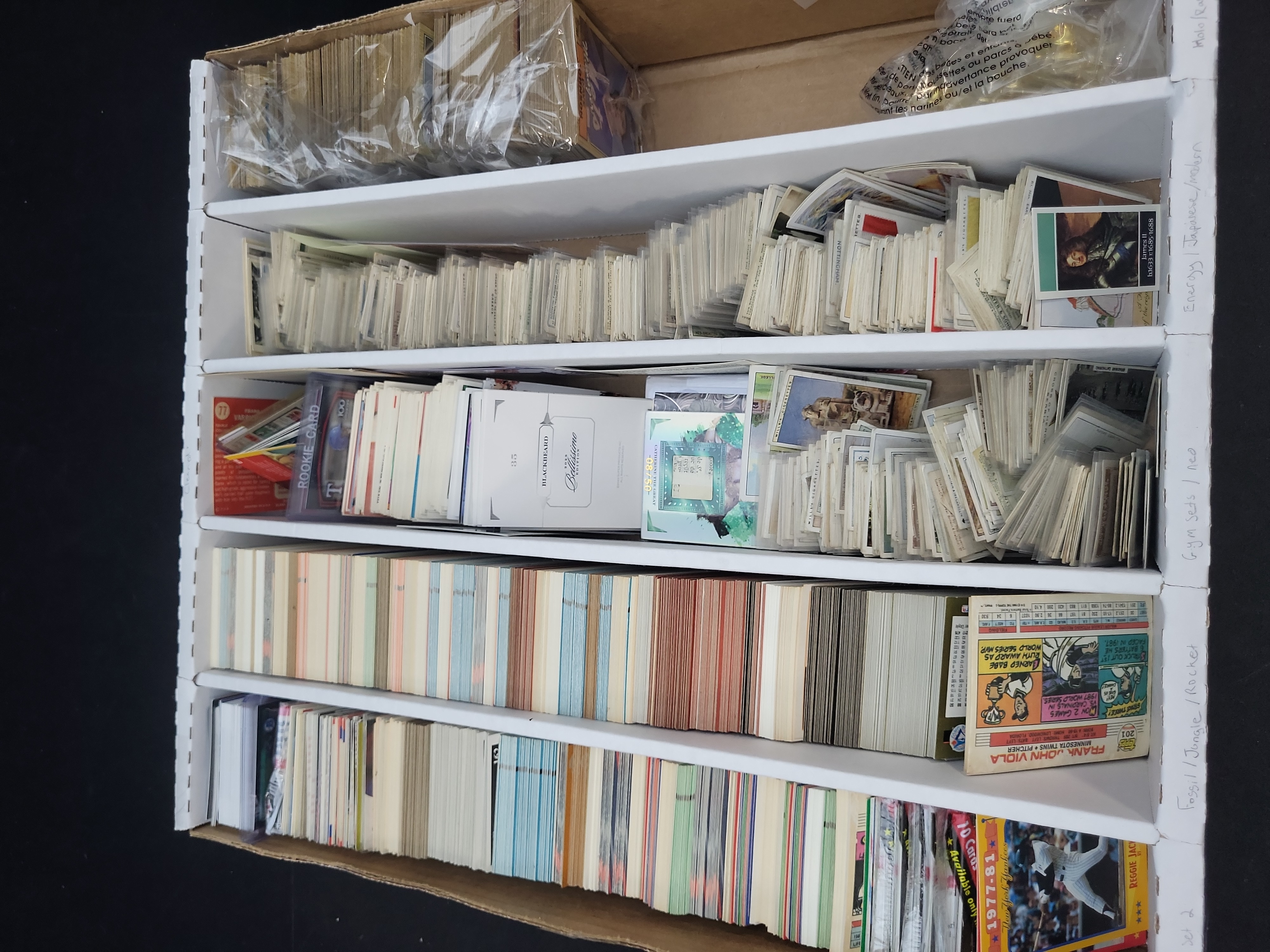 I03319 | An Assortment of Vintage Tobacco Cards, 1980s Baseball Cards, Garbage Pail Kids, and Sports Memorabilia