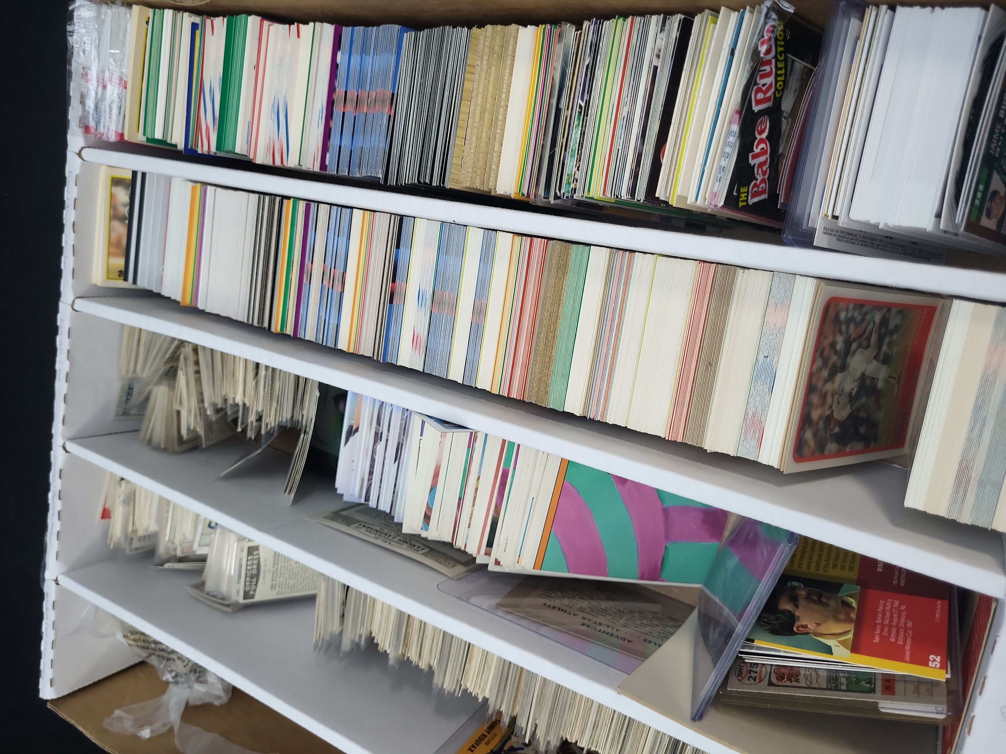 I03319 | An Assortment of Vintage Tobacco Cards, 1980s Baseball Cards, Garbage Pail Kids, and Sports Memorabilia