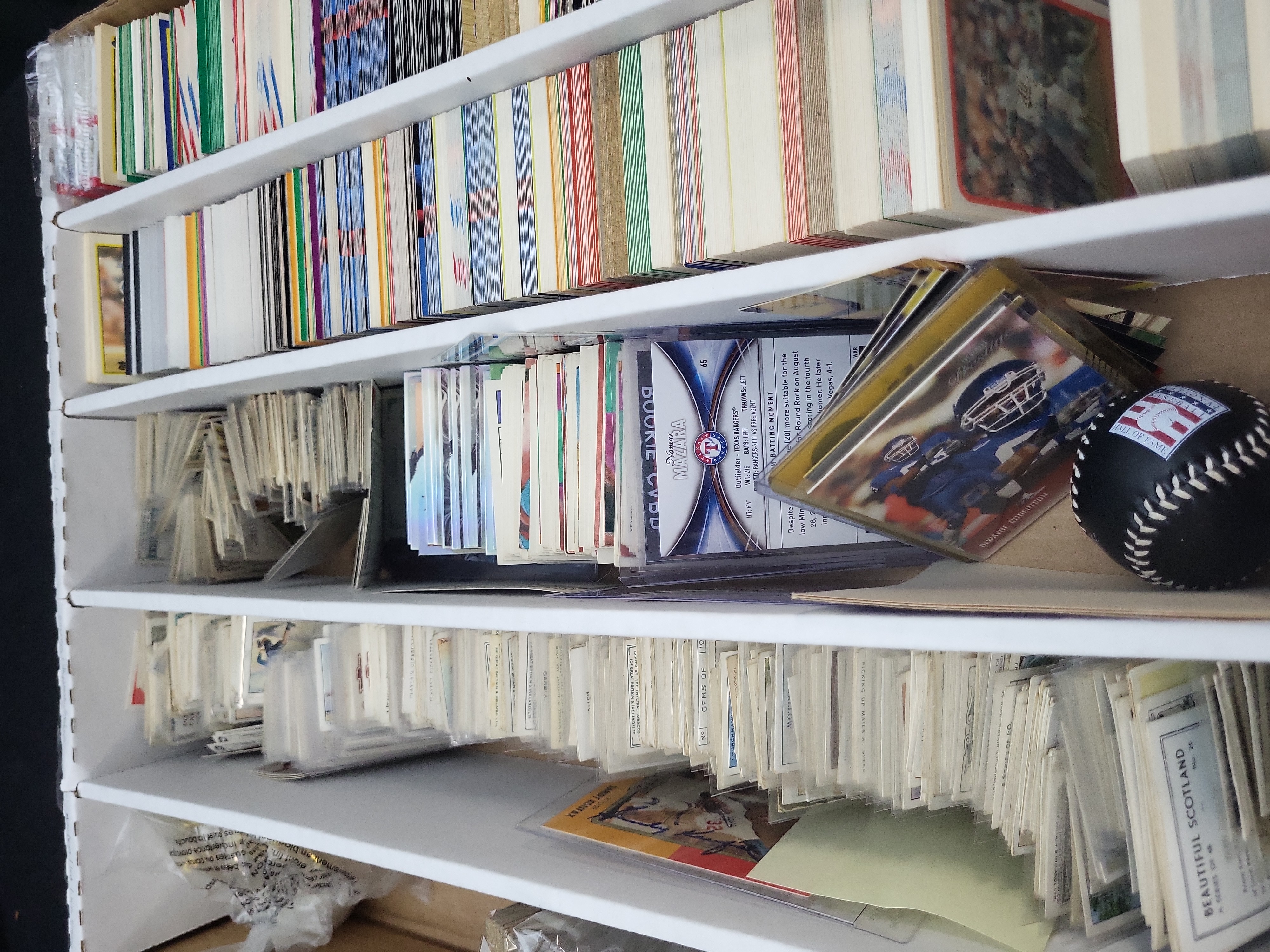 I03319 | An Assortment of Vintage Tobacco Cards, 1980s Baseball Cards, Garbage Pail Kids, and Sports Memorabilia