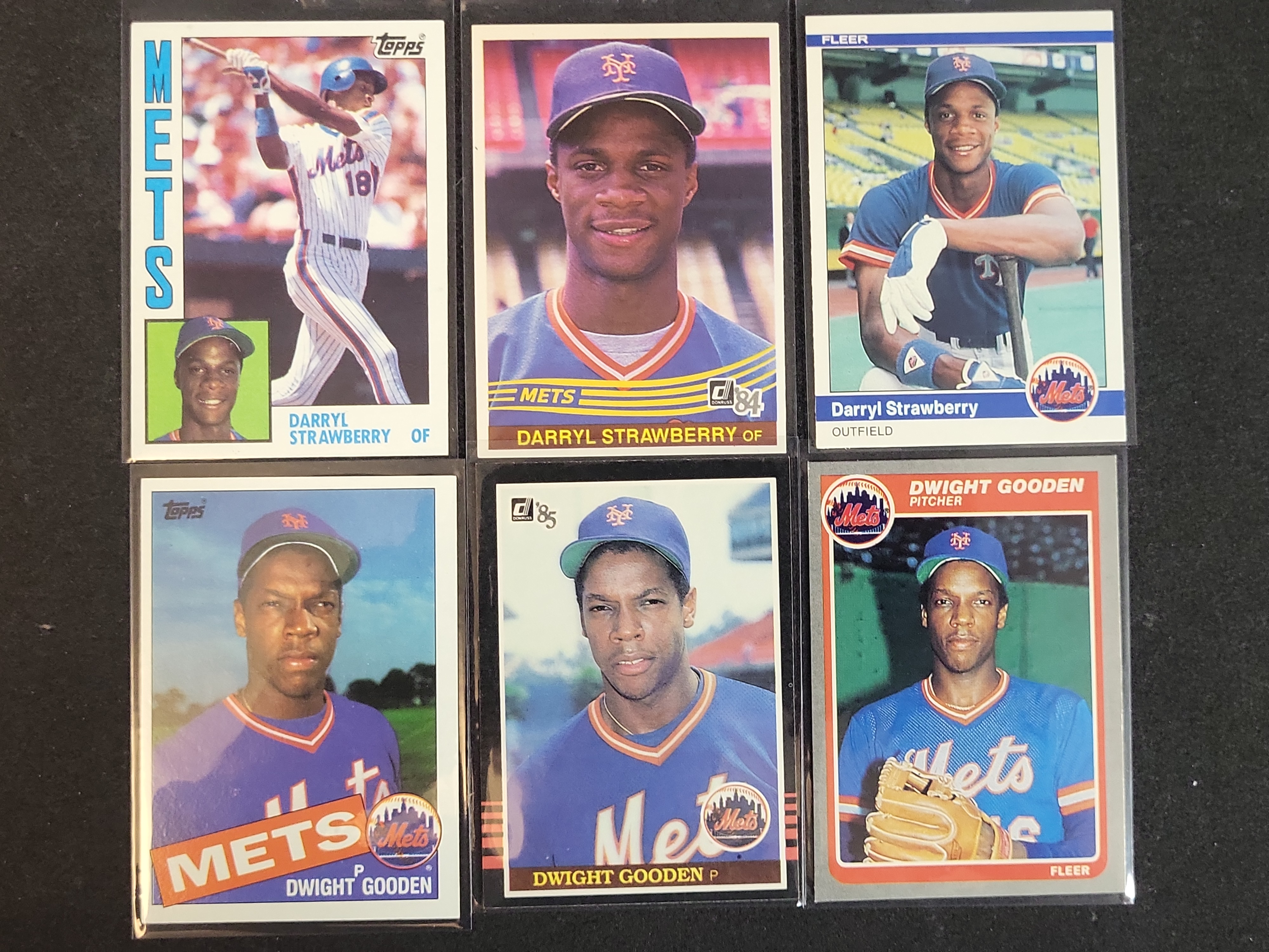 I03931 | A Collection of Vintage Baseball Trading Cards Including 1982 Fleer Cal Ripken Jr. Rookie Card and New York Mets Rookie Cards