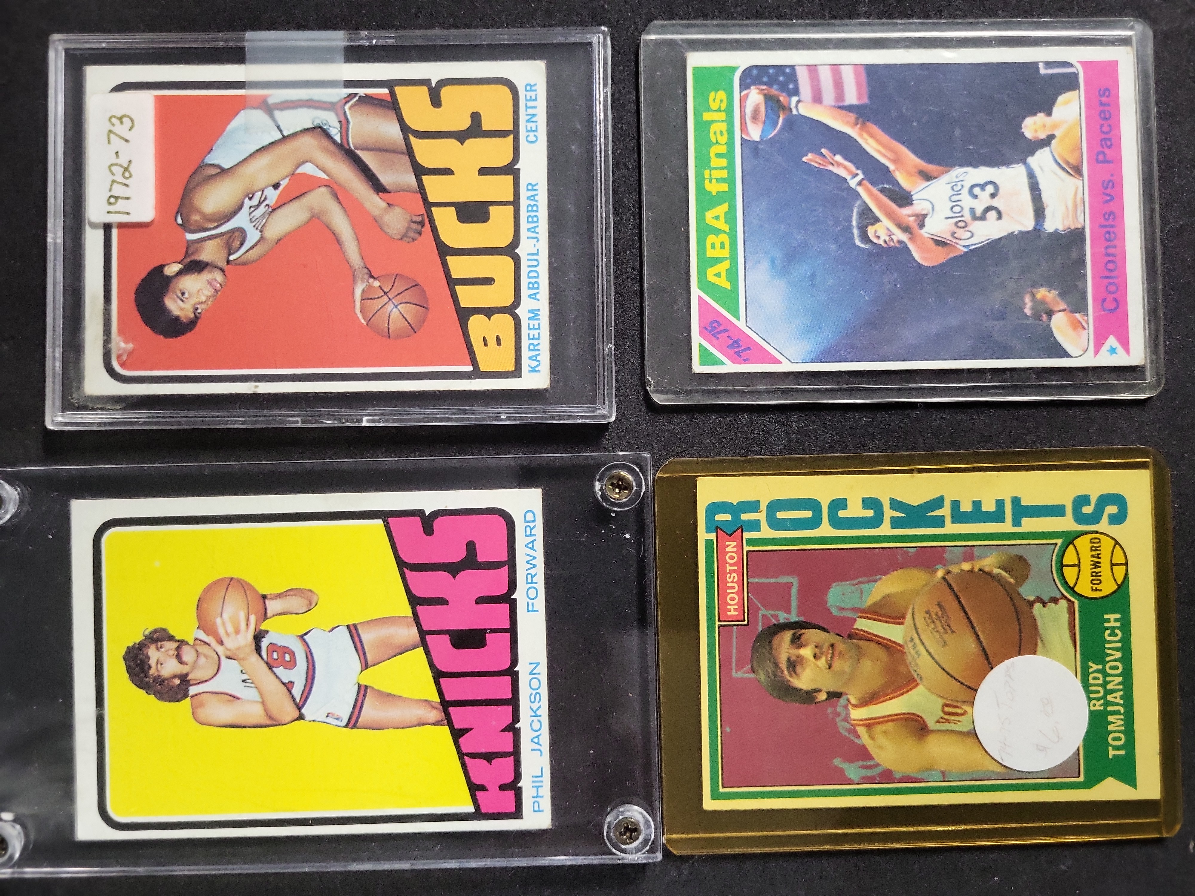 I03819 | A Group of Vintage Topps Basketball Cards Including Kareem Abdul-Jabbar and Phil Jackson