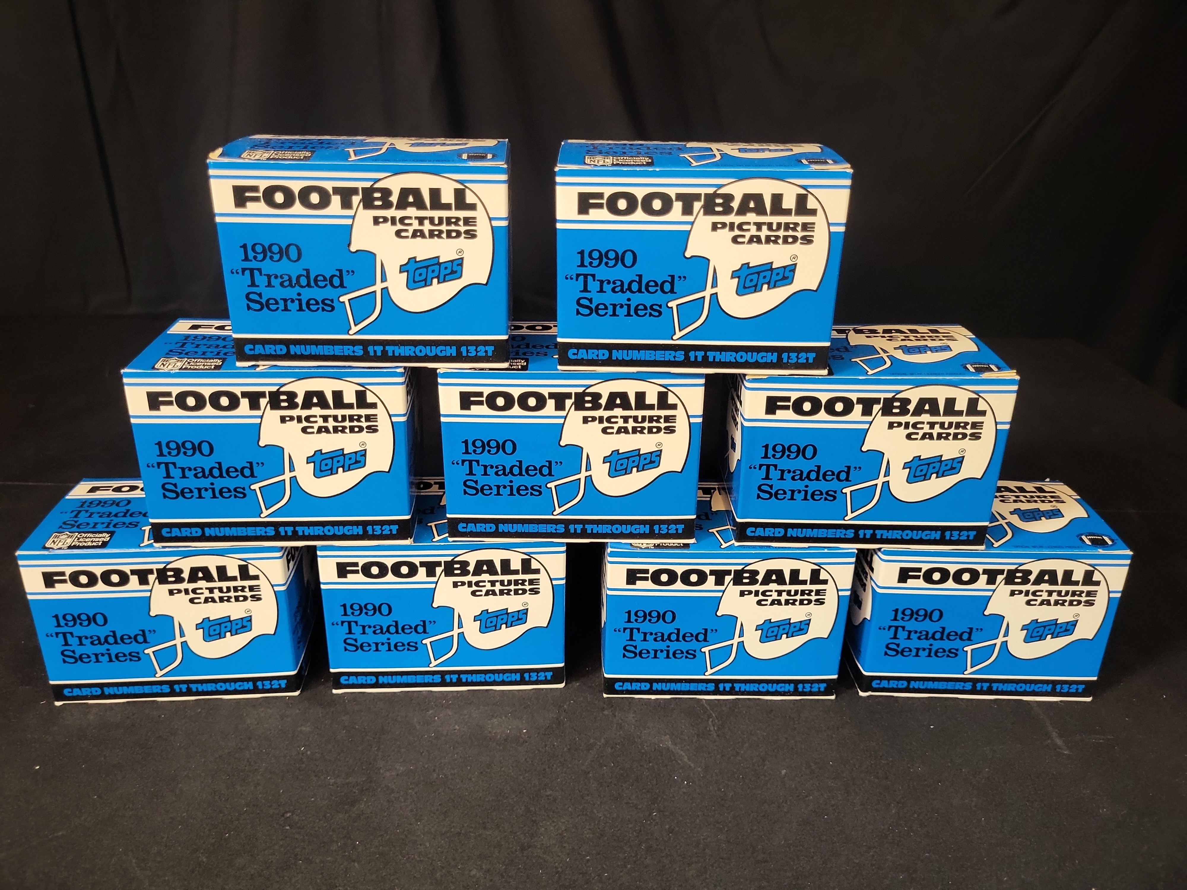 I03252 | Group of 9 1990 Topps Football Traded Series Factory Set Boxes