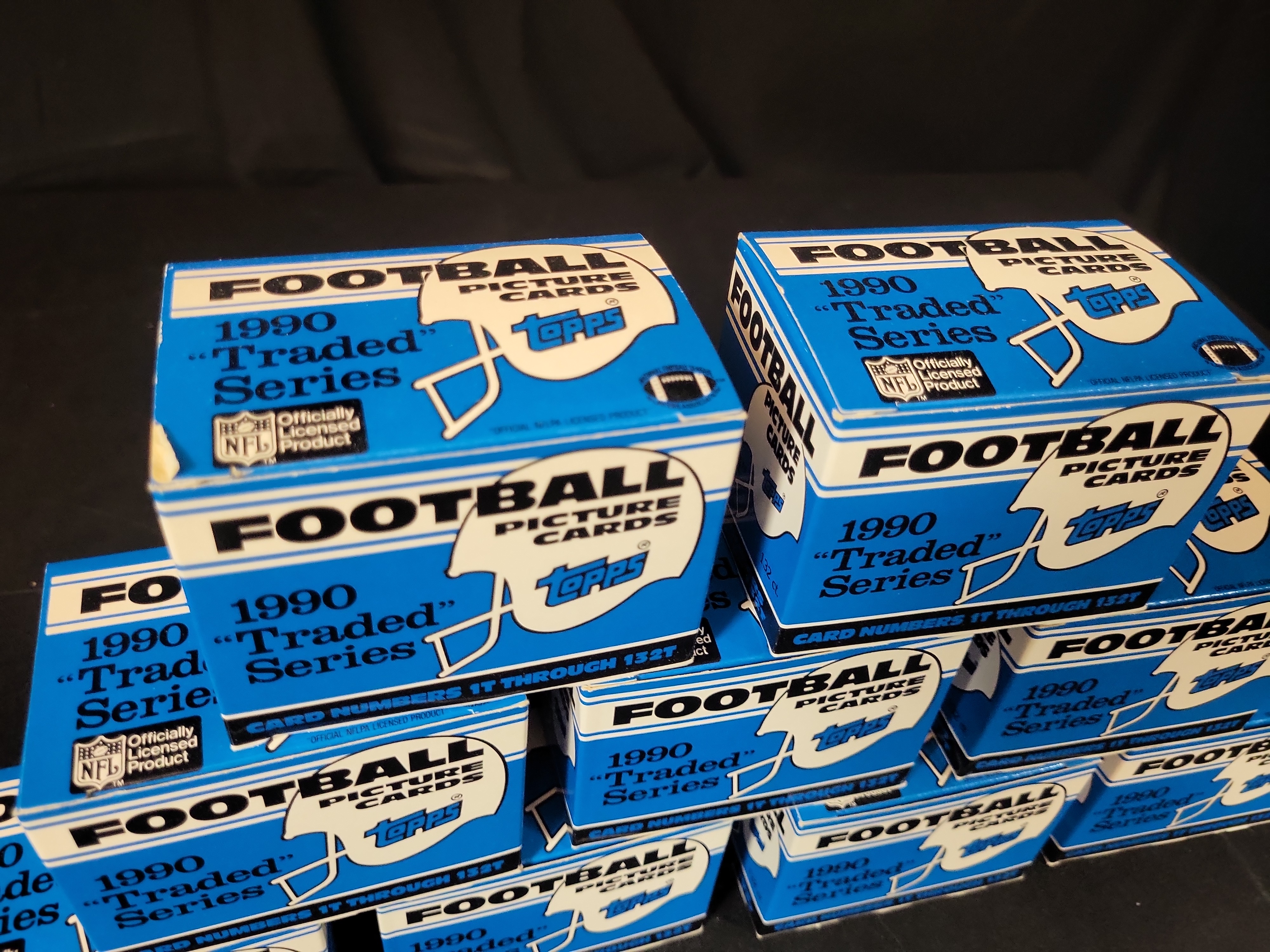 I03252 | Group of 9 1990 Topps Football Traded Series Factory Set Boxes