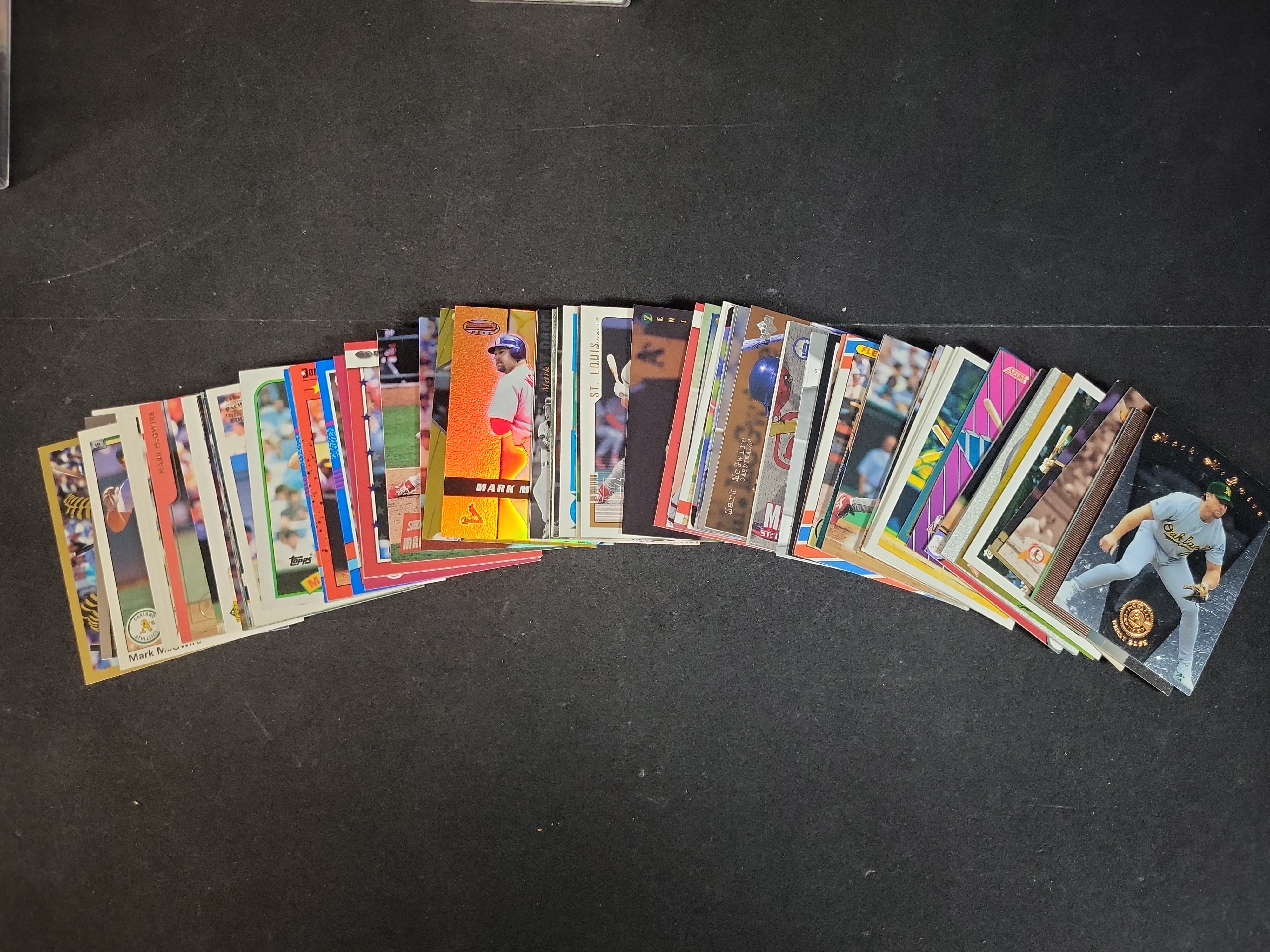 I03224 | A Collection of Baseball Trading Card Player Lots Including Jeff Bagwell Roger Clemens Mark McGwire and Will Clark