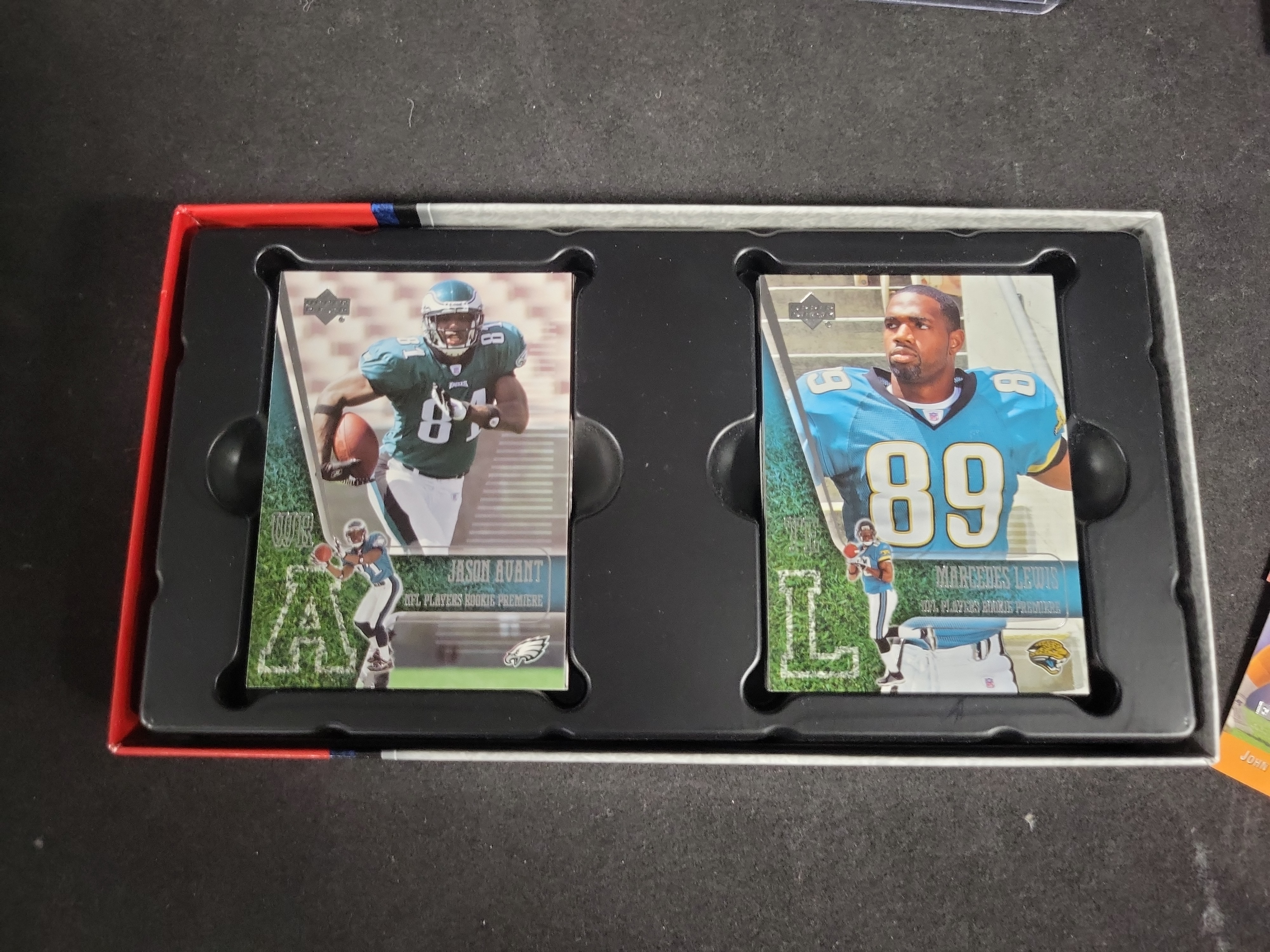 I03828 | A Collection of NFL Trading Cards Including 2006 Upper Deck Rookie Premiere Box Set and 1993 Upper Deck SP Cards