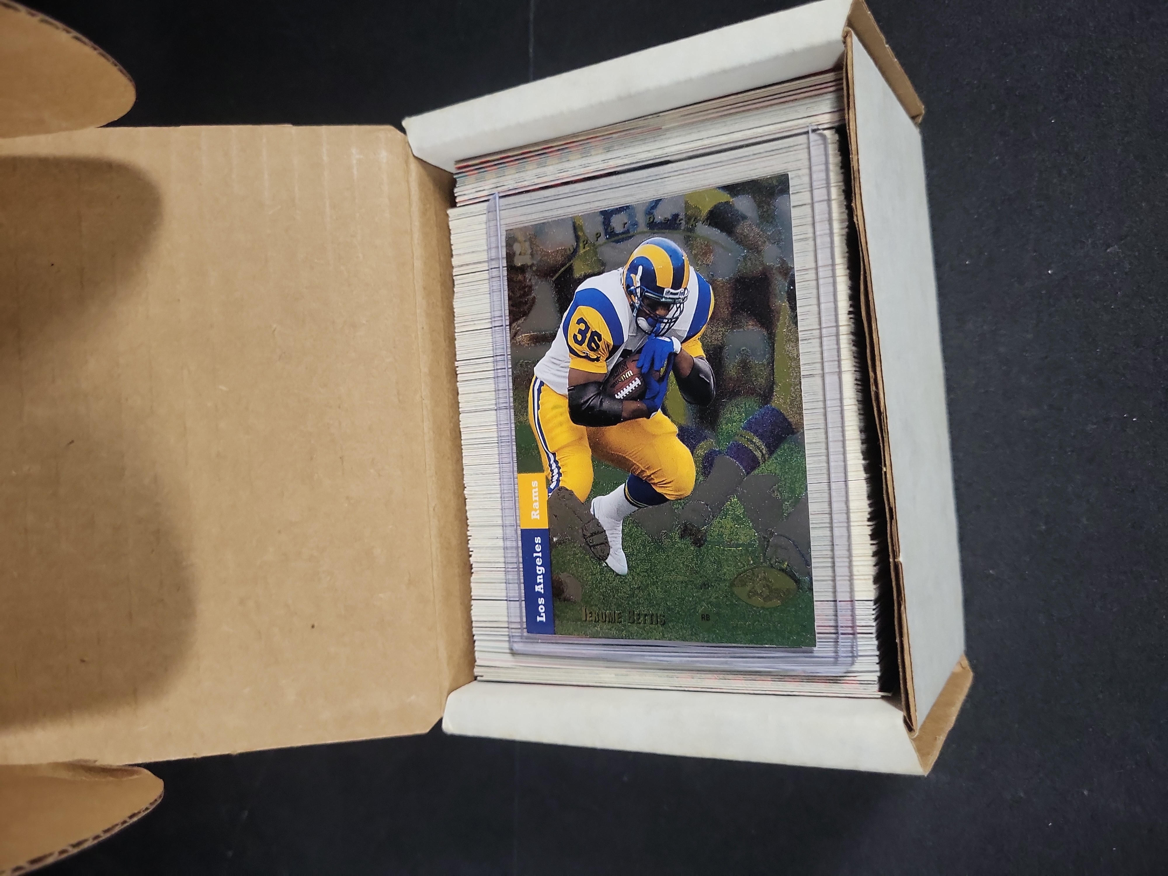 I03828 | A Collection of NFL Trading Cards Including 2006 Upper Deck Rookie Premiere Box Set and 1993 Upper Deck SP Cards