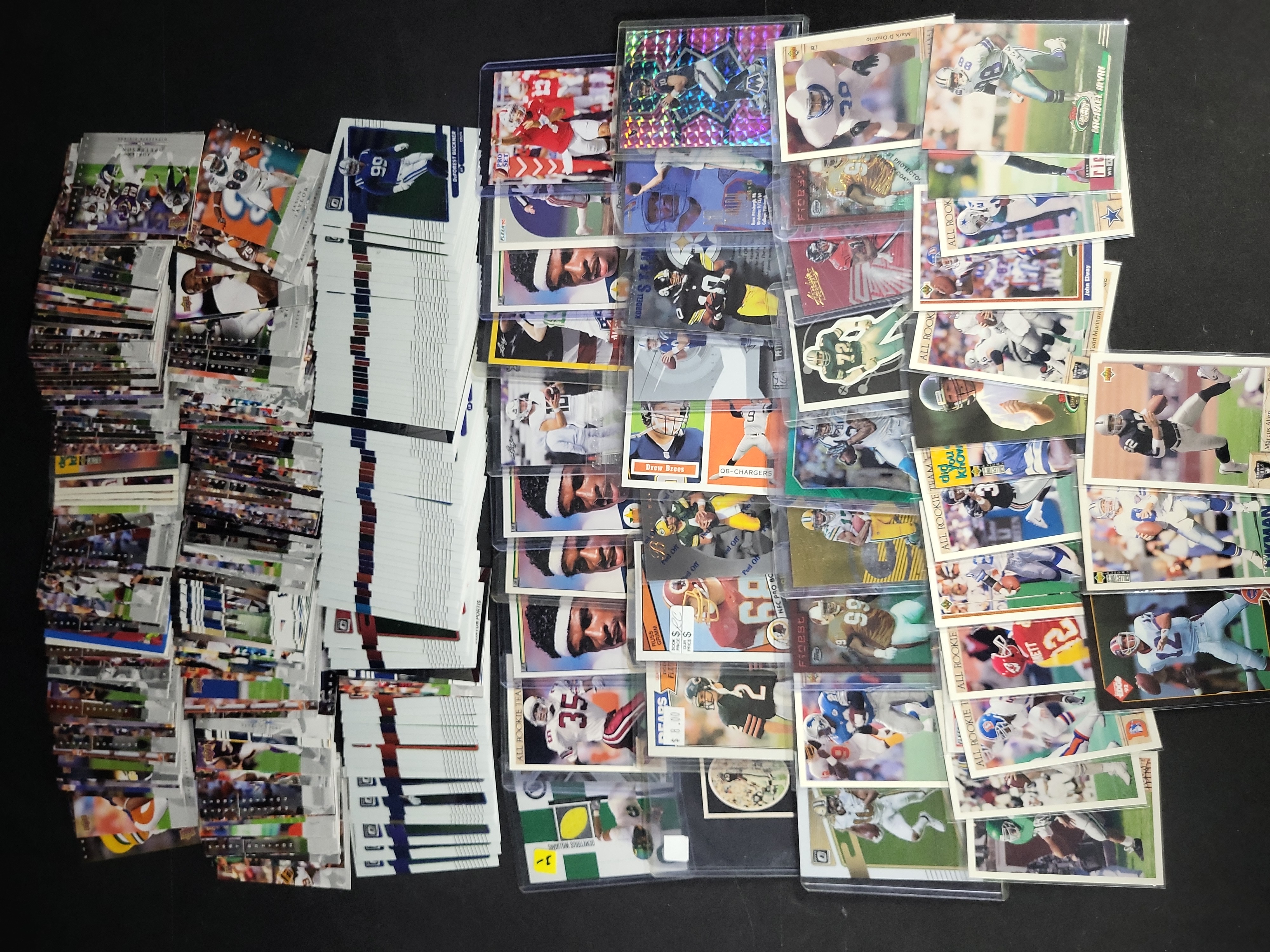 I03842 | A Large Collection of Multi-Era NFL Football Trading Cards Including Panini Upper Deck and Topps