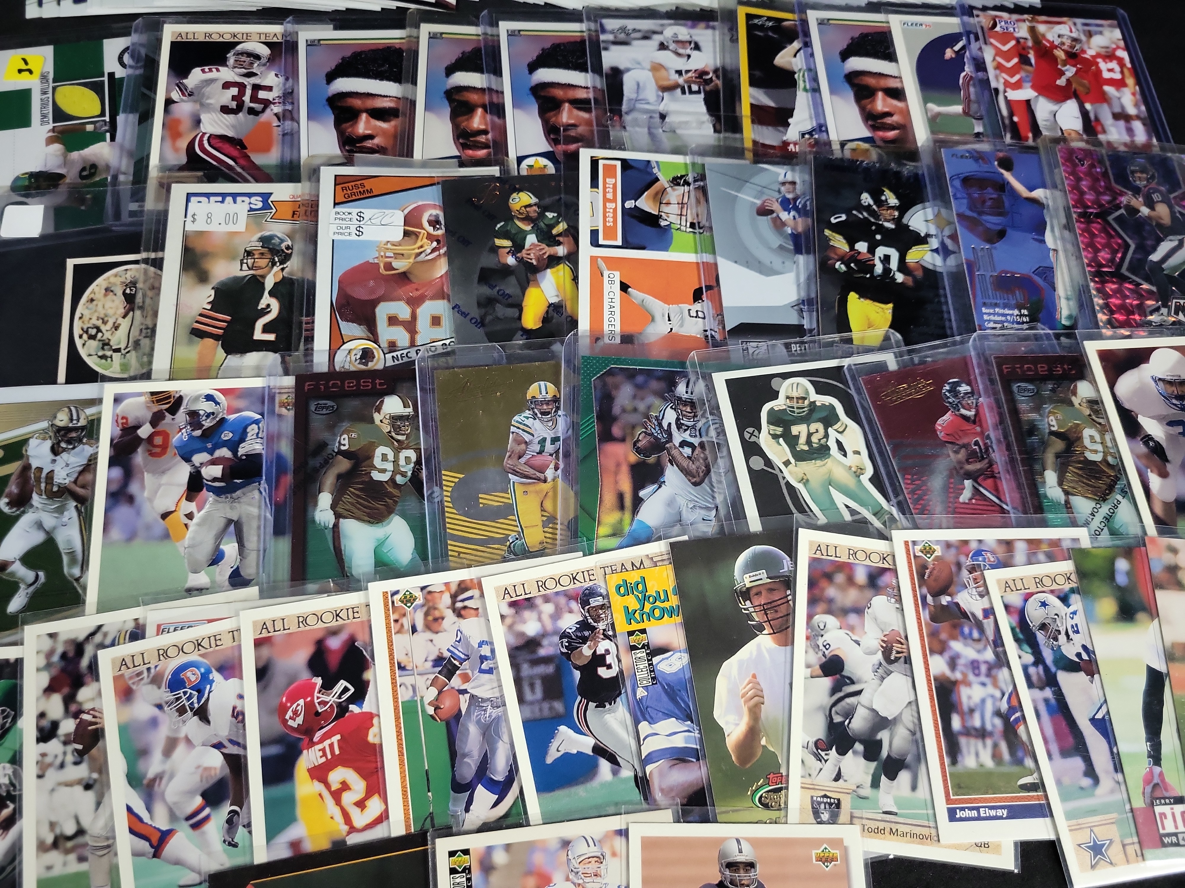 I03842 | A Large Collection of Multi-Era NFL Football Trading Cards Including Panini Upper Deck and Topps